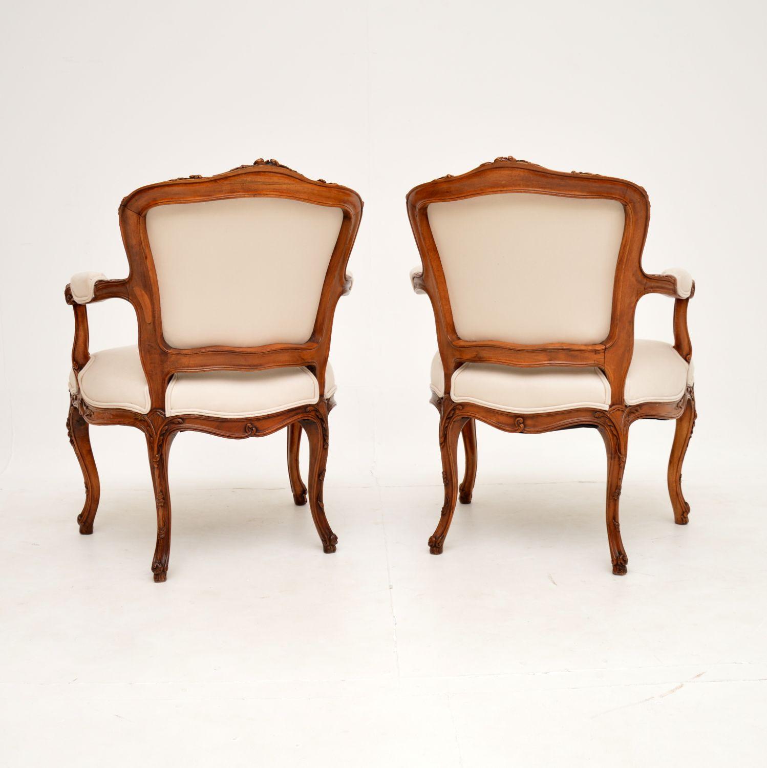 Louis XV Pair of Antique French Carved Walnut Salon Chairs