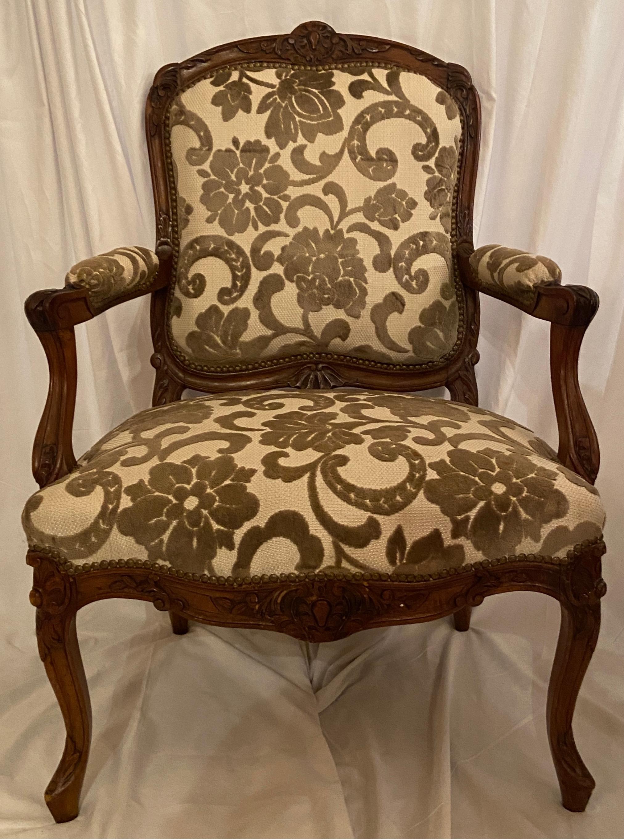 Pair of Antique French carved walnut sage & Ivory upholstered armchairs, Circa 1860.
These nicely carved armchairs would fit in a traditional or contemporary setting.
