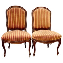 Pair of Antique French Carved Walnut 
Upholstered Side Chairs