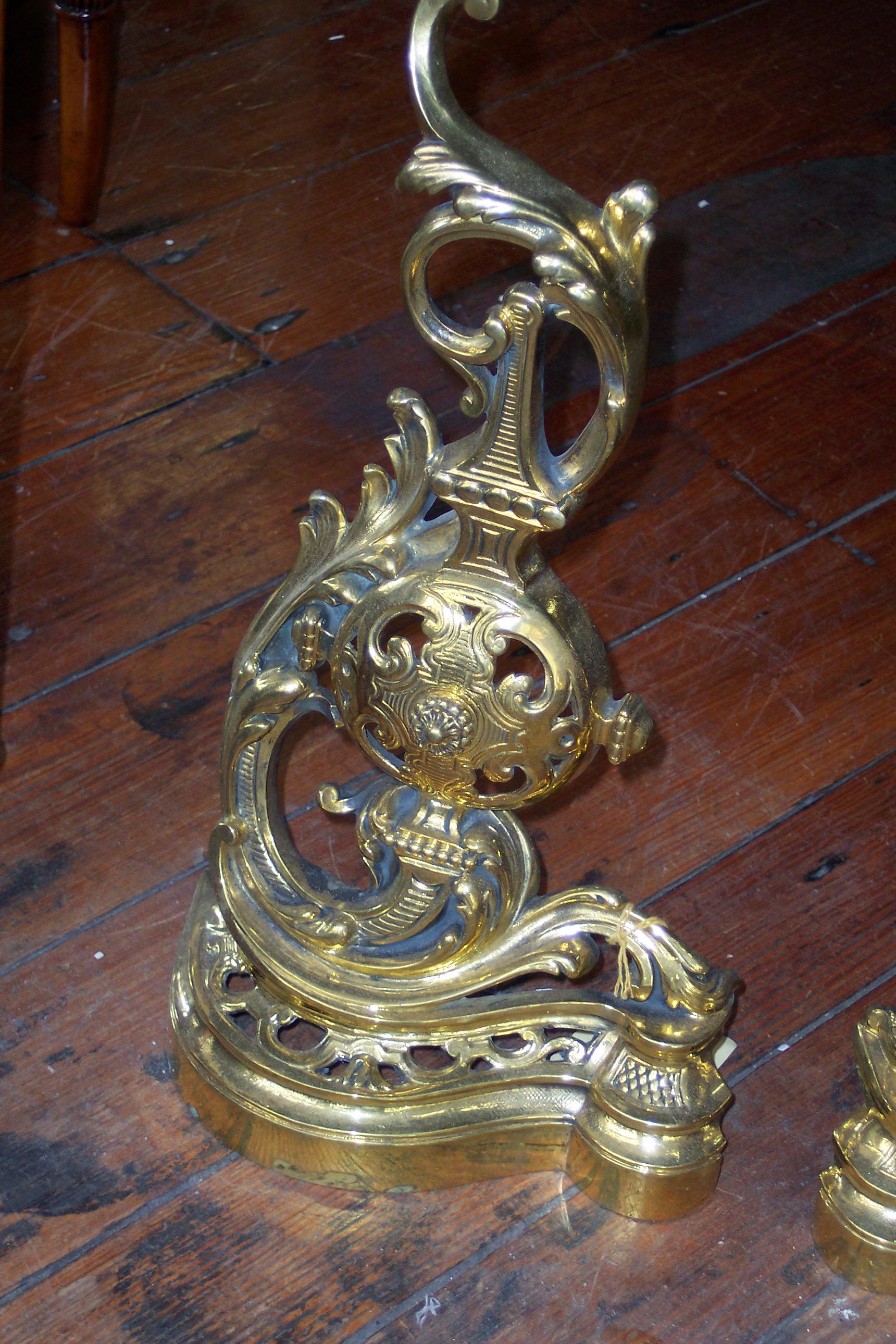 Pair of fine antique French cast brass Rococo style chenet or andirons.