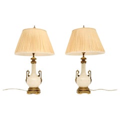 Coppia di lampade da tavolo francesi antiche in ceramica e metallo dorato
