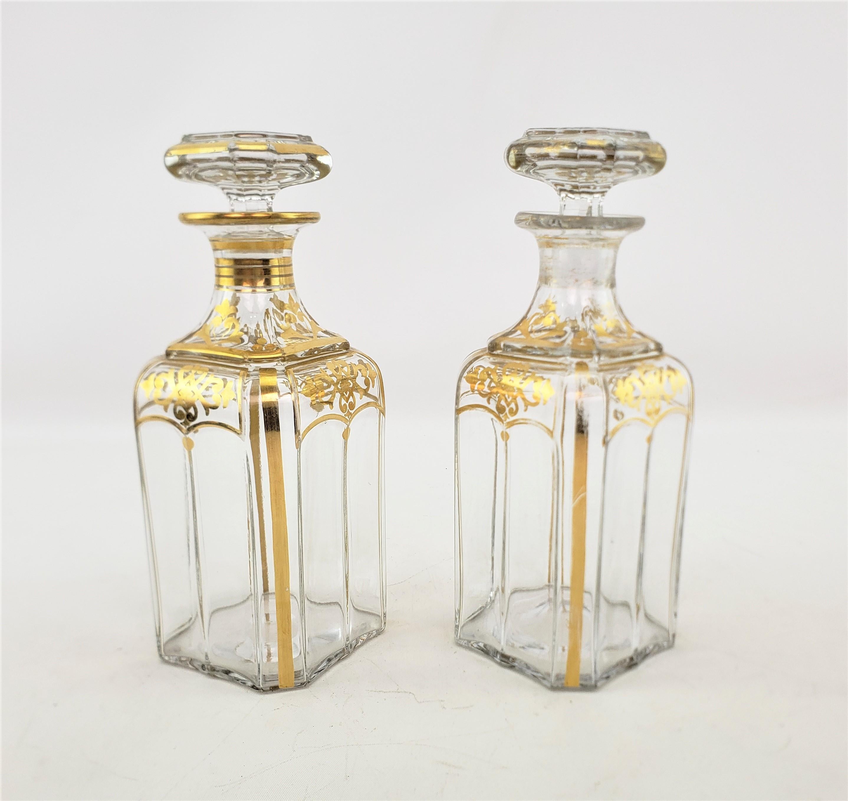 Empire Revival Pair of Antique French Clear Crystal Bottle Decanters with Gilt Decoration For Sale