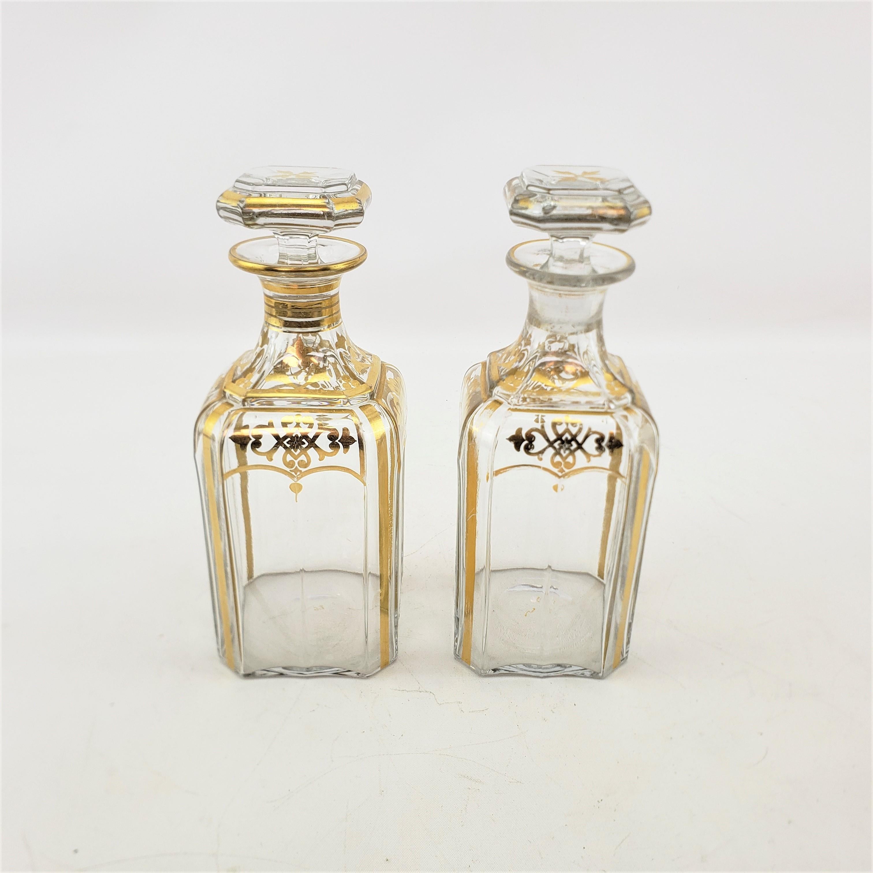 20th Century Pair of Antique French Clear Crystal Bottle Decanters with Gilt Decoration For Sale
