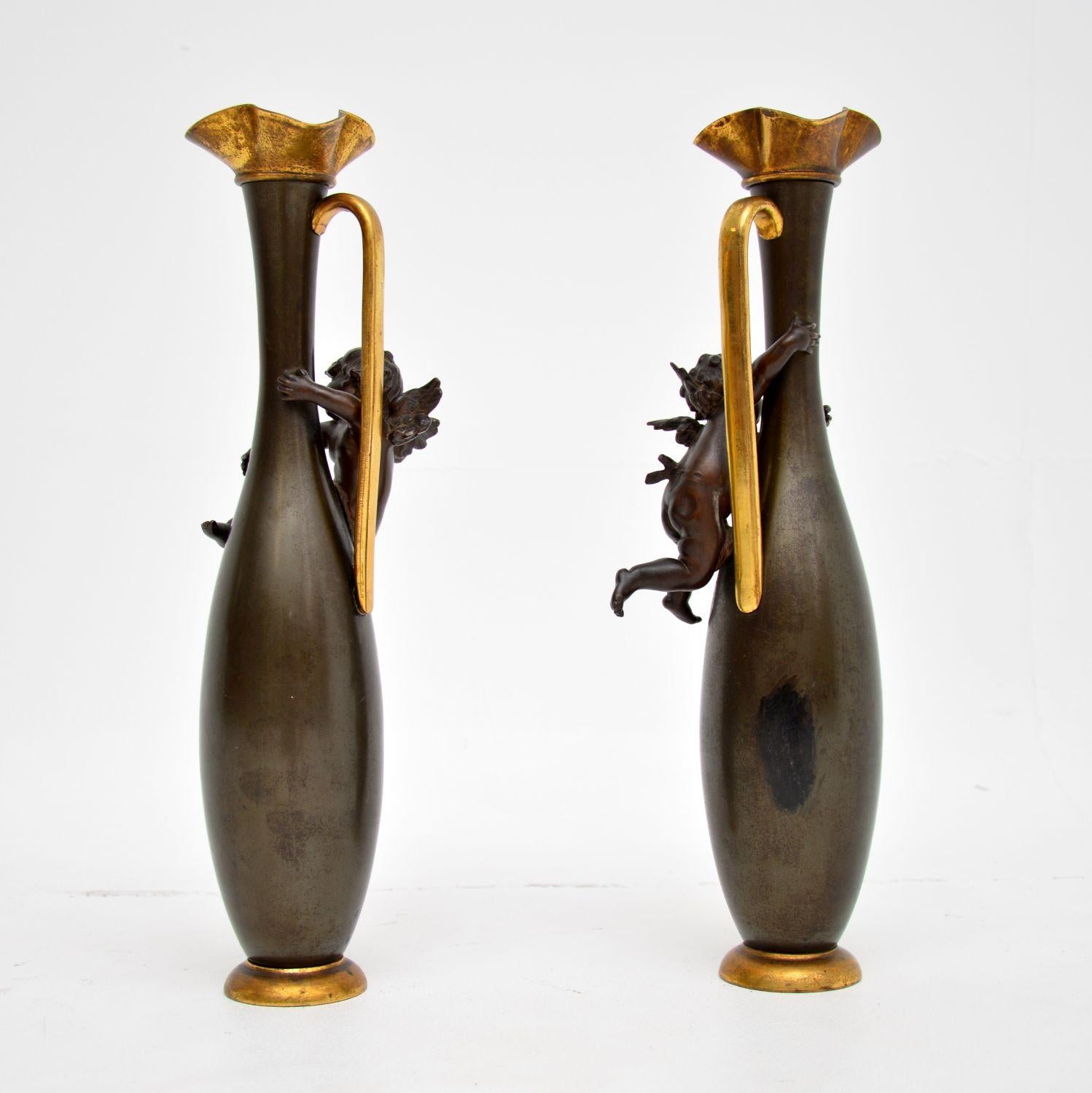Louis XV Pair of Antique French Decorative Bronze Pitchers For Sale