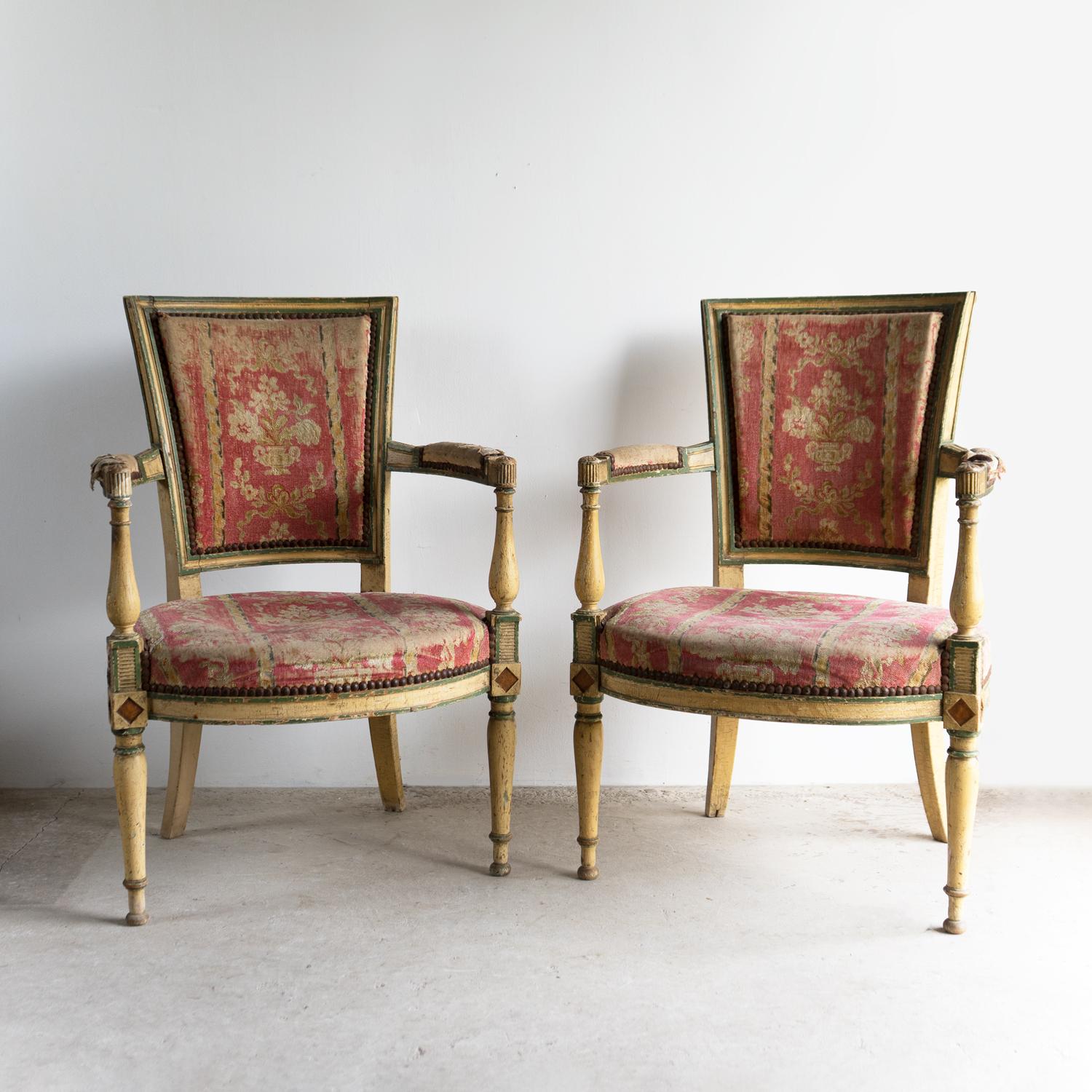 PAIR OF ANTIQUE FRENCH UPHOLSTERED CHAIRS

A pair of extremely romantic chairs with carved frames, painted in a buttery cream paint with sap green and orange details. naturally worn over time to great effect.

Naturally worn pink floral upholstery,