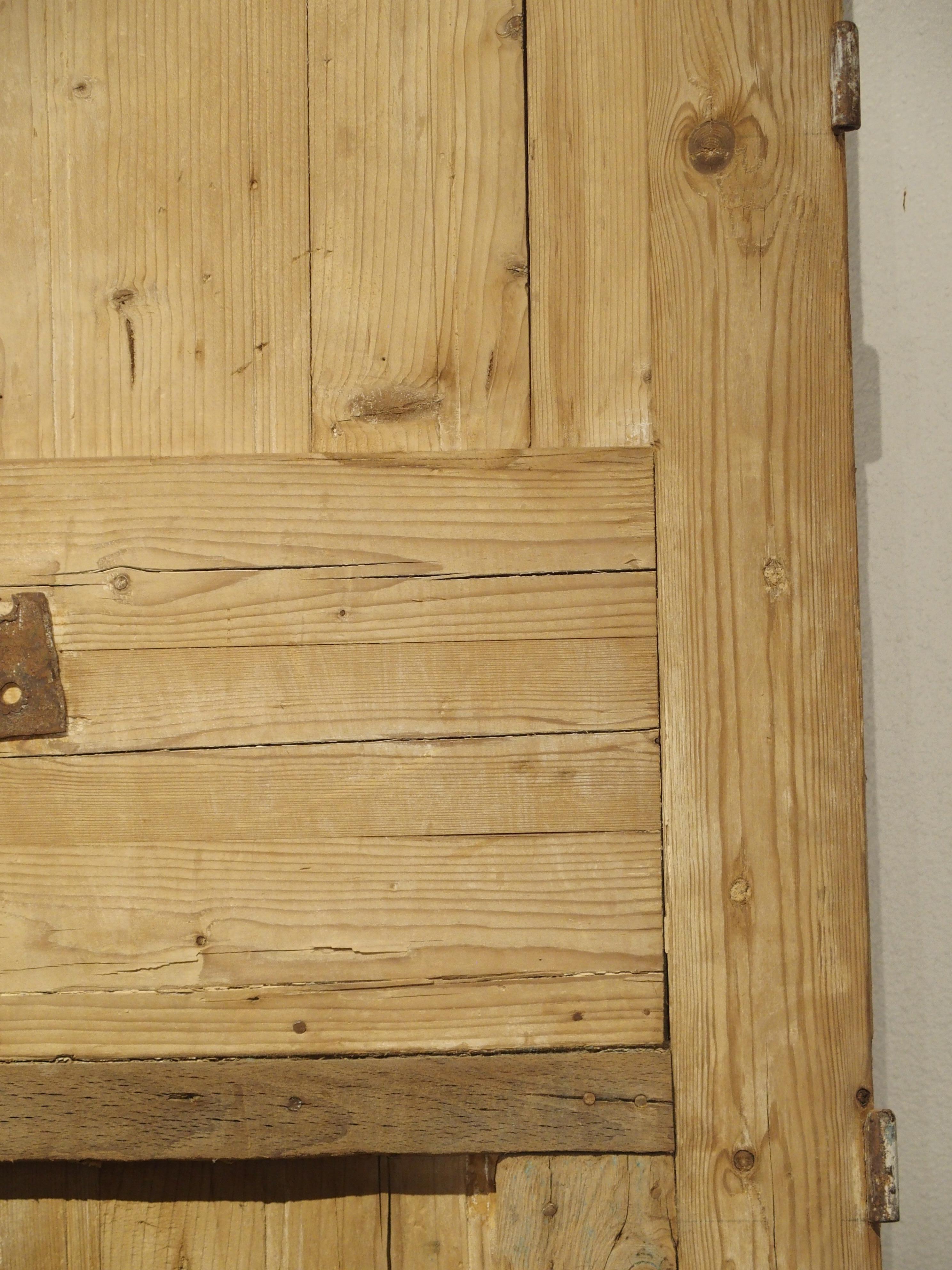 This pair of antique pine doors were hand carved in Egypt in the early 1900’s. They were produced at a time when French architecture and style had a great influence on the Egyptian culture, especially in Cairo. Some Renaissance style,