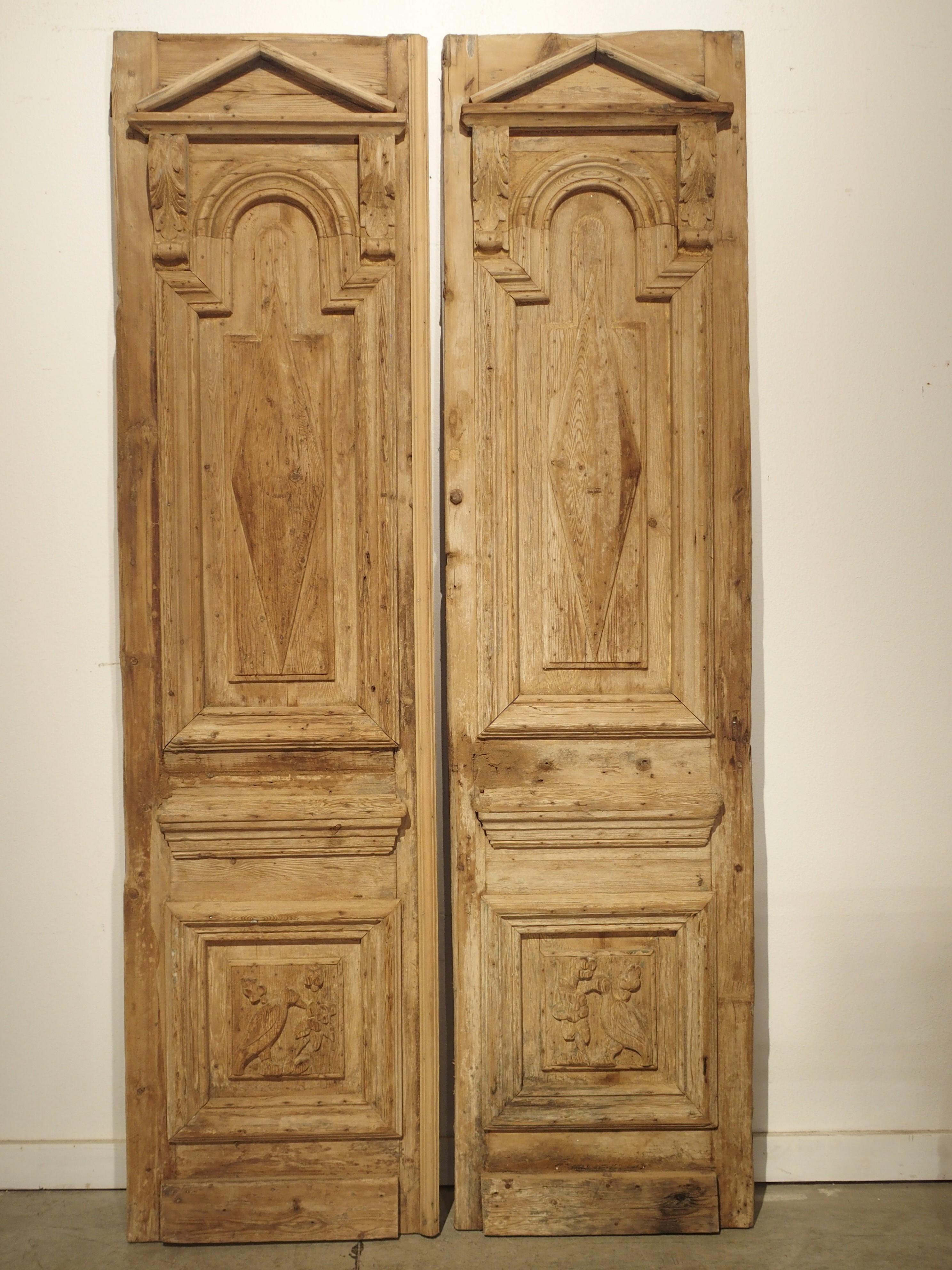 Pair of Antique French Egyptian Pine Doors with Carved Bird Motifs 5