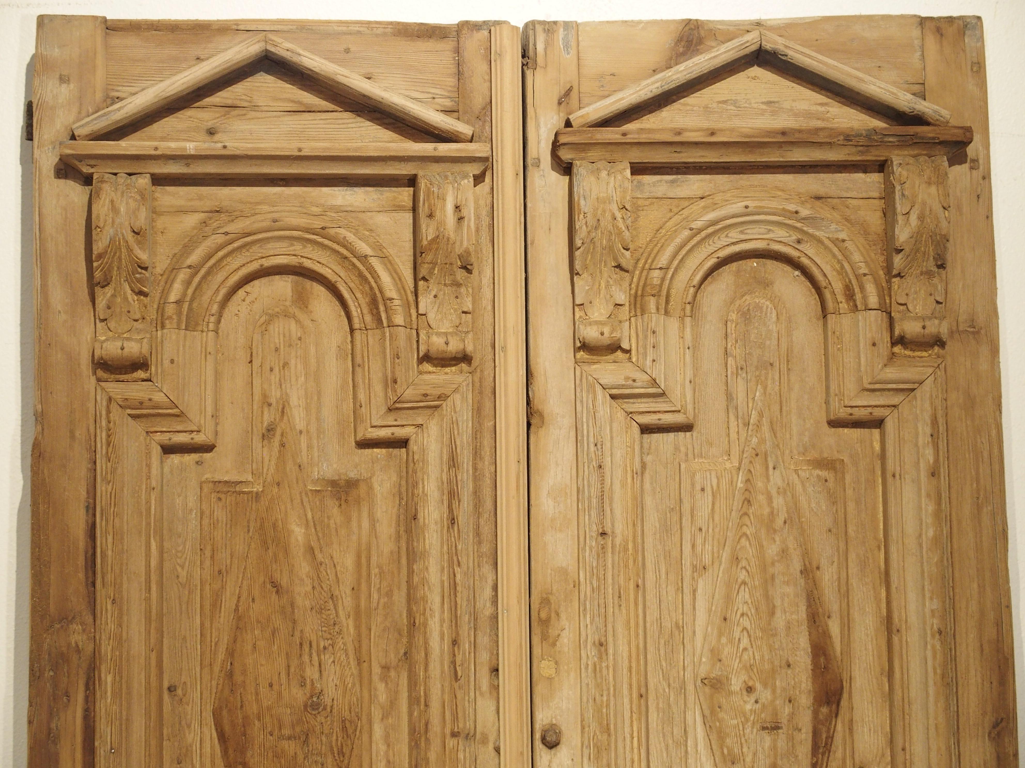 Neoclassical Pair of Antique French Egyptian Pine Doors with Carved Bird Motifs