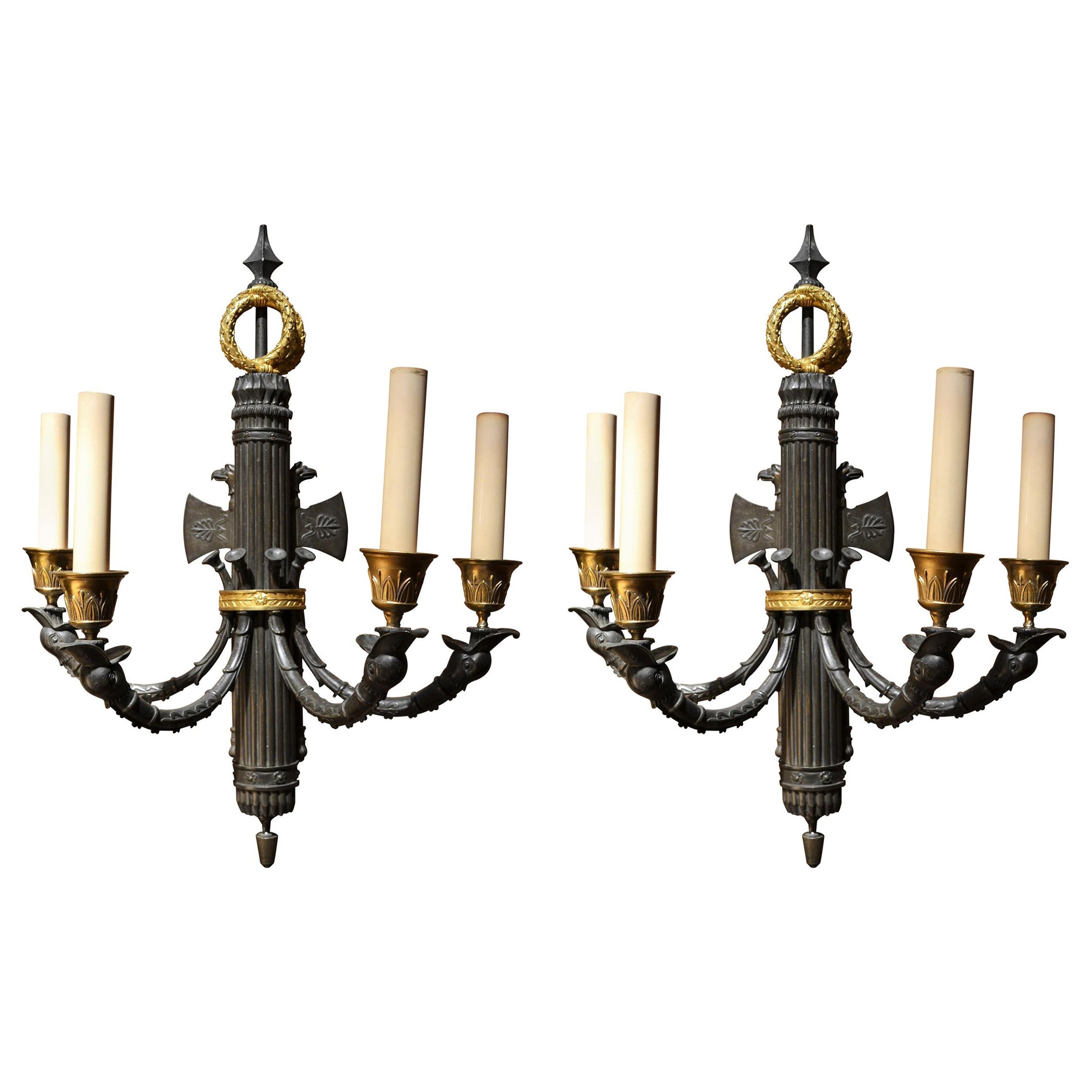 Coppia di antiche lampade impero francesi in oro e bronzo patinato