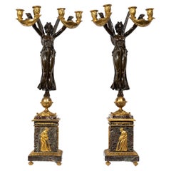 Pair of Antique French Empire Style Figural Patinated and Gilt Bronze Candelabra