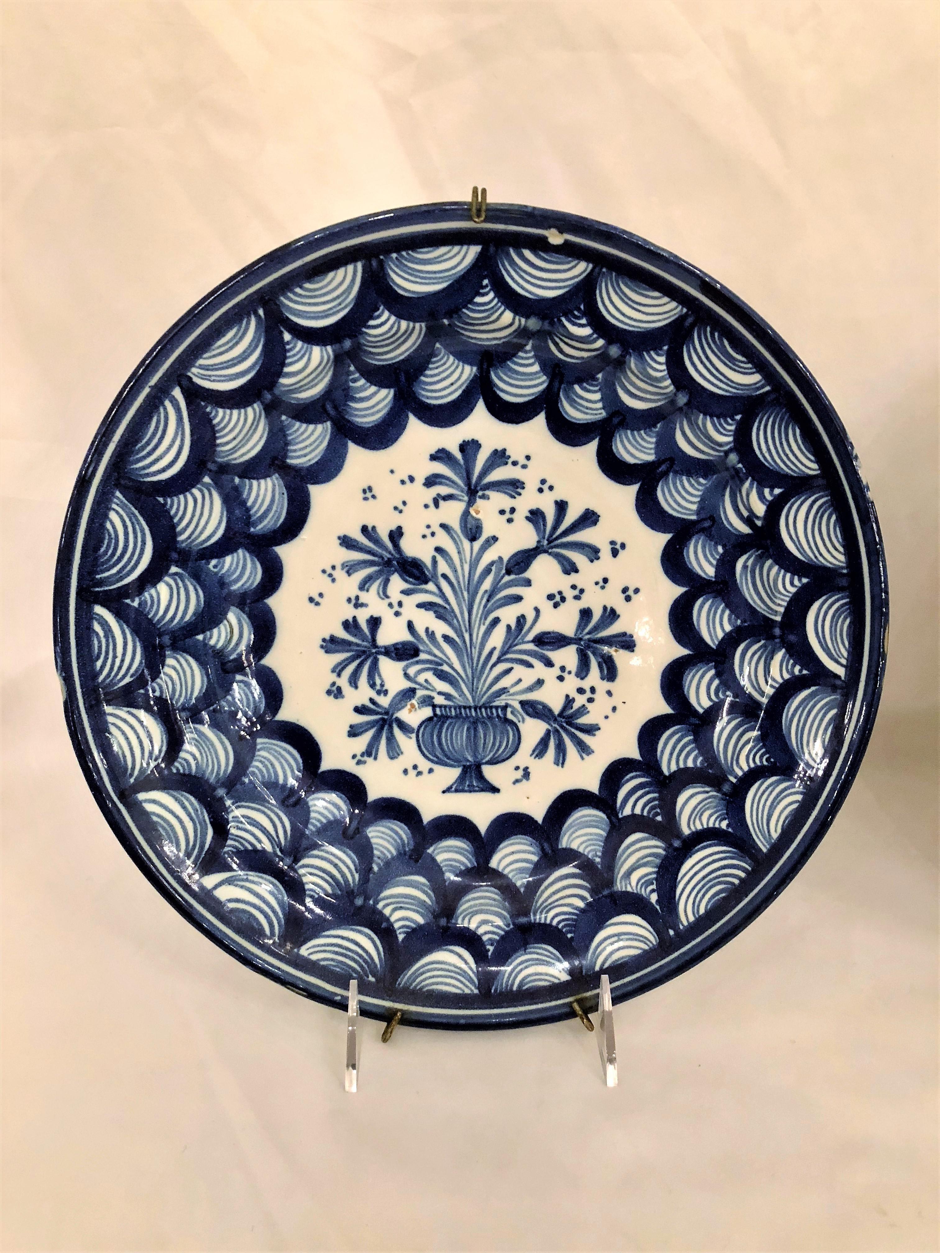 Pair of antique French faience blue and white chargers.