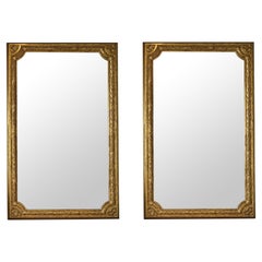 Paire d'anciens miroirs français dorés à feuilles de laurier.  Vendu séparément