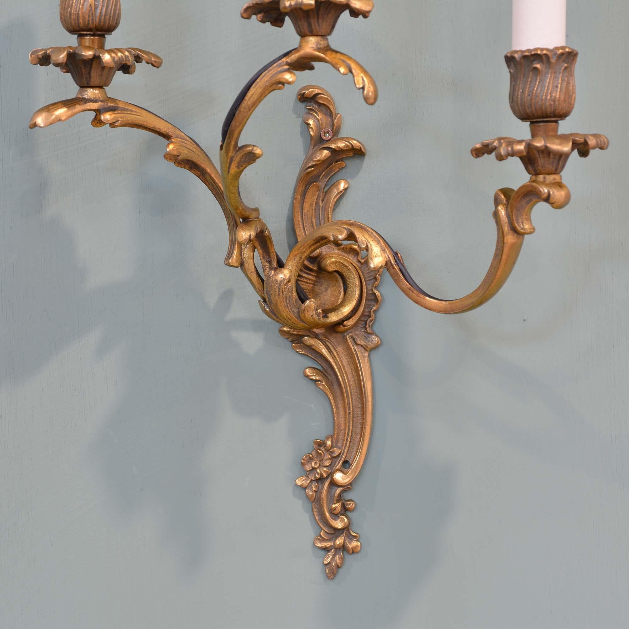 20th Century Pair of antique French gilt brass Rococo wall lights For Sale