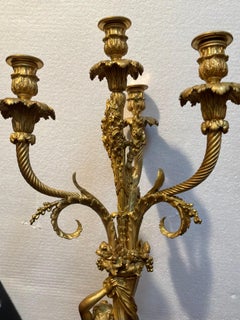 Pair of antique French gilt bronze candleabrum figural with four holders each