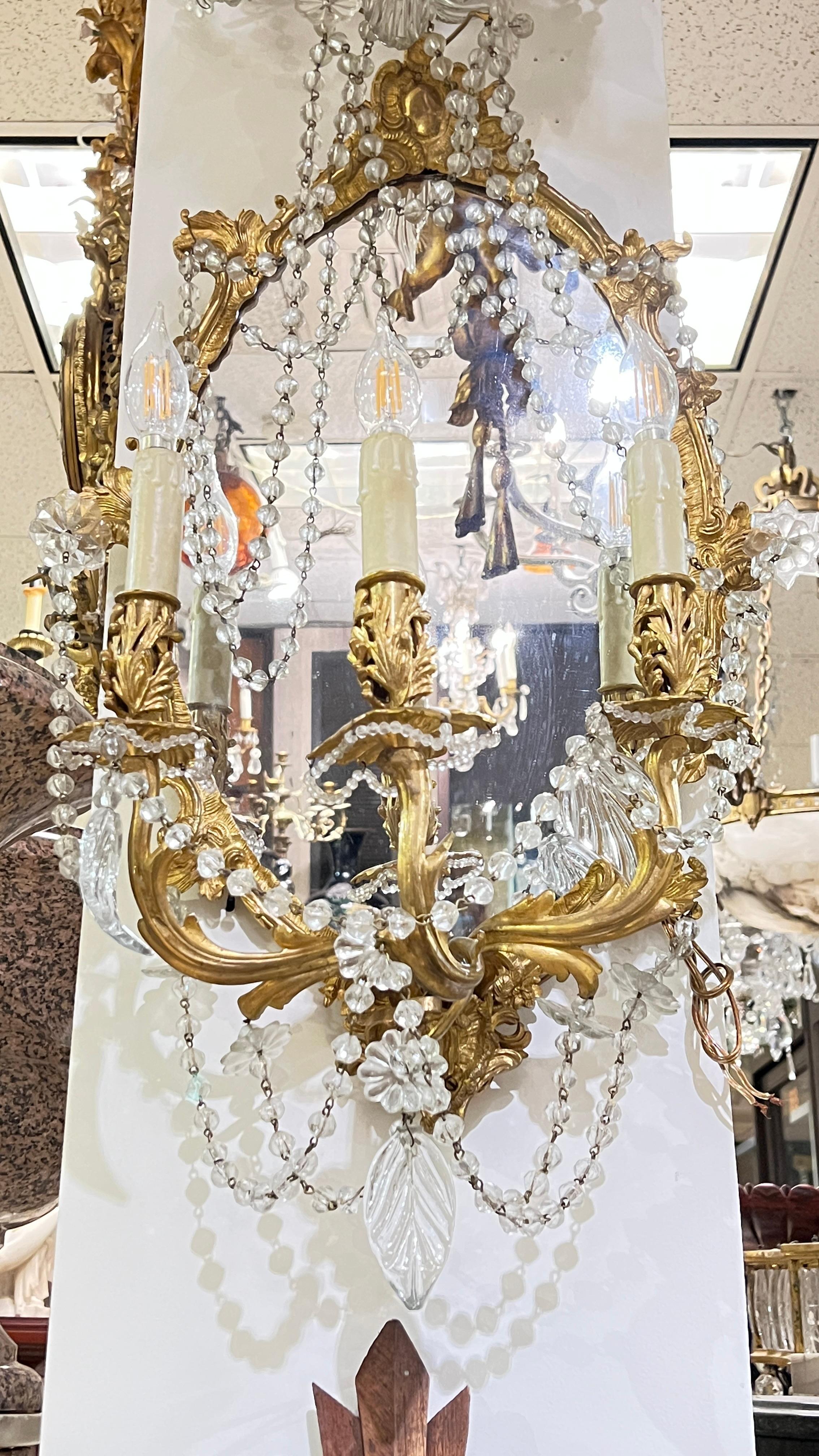 Pair of antique French  Gilt Bronze Mirrored Three-Light Sconces For Sale 6