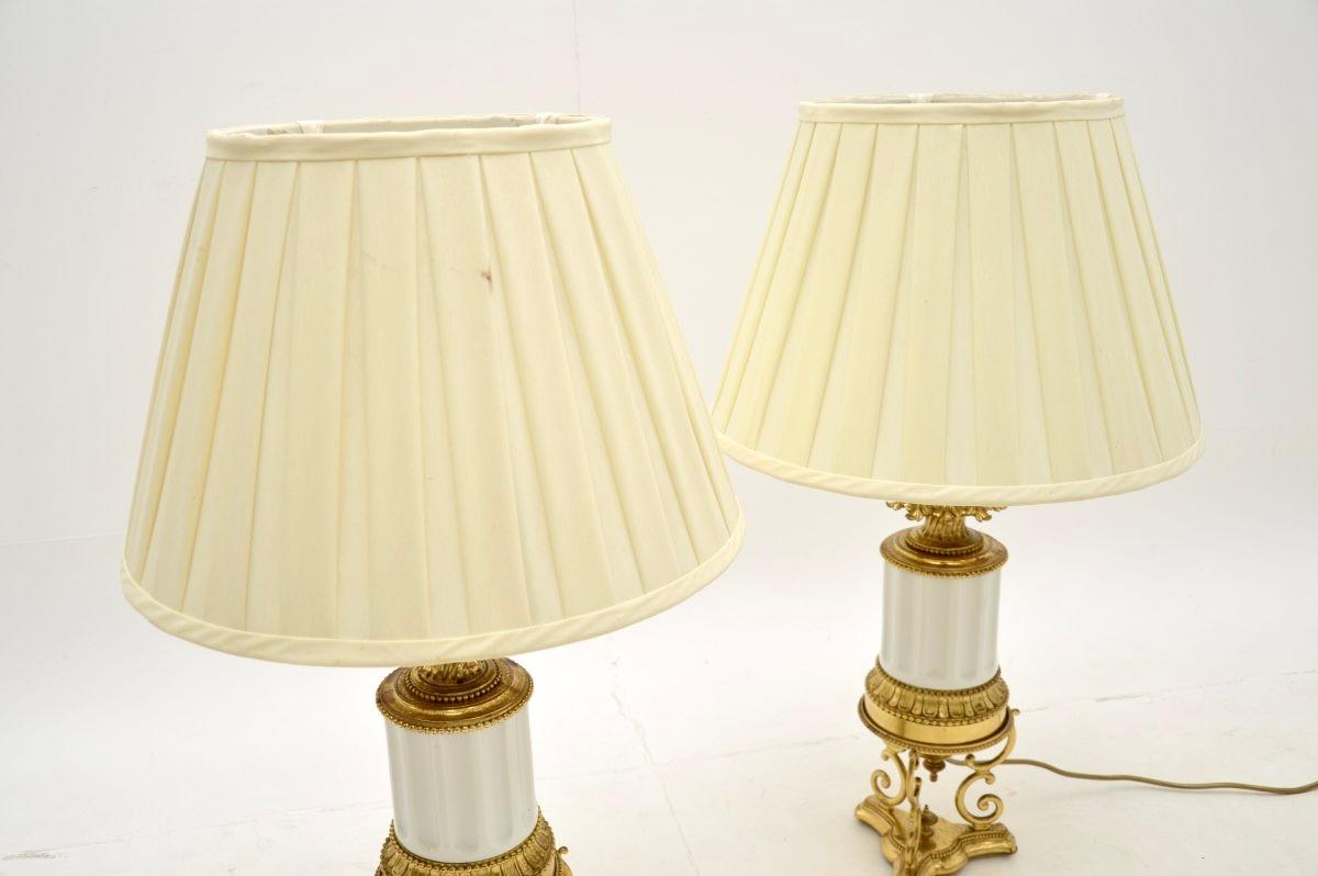 Neoclassical Pair of Antique French Gilt Metal and Ceramic Table Lamps For Sale