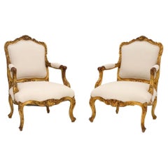 Paire de fauteuils anciens en bois doré français