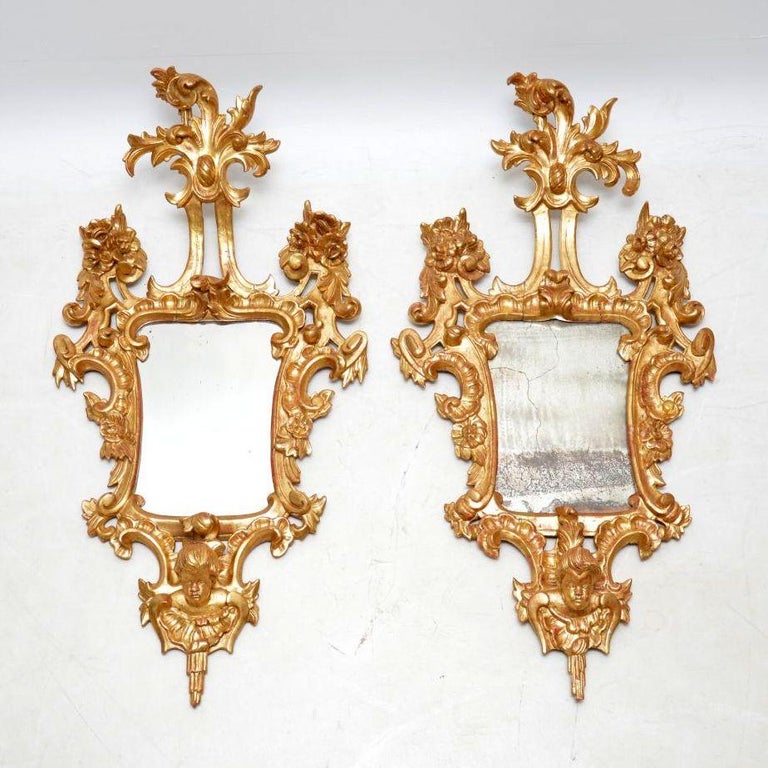 Stunning pair of antique French or Italian gilt wood mirrors in very good original condition & with magnificent carved details all over.

Please enlarge all the images to see the quality of the carvings, the original finish of the gilding & the