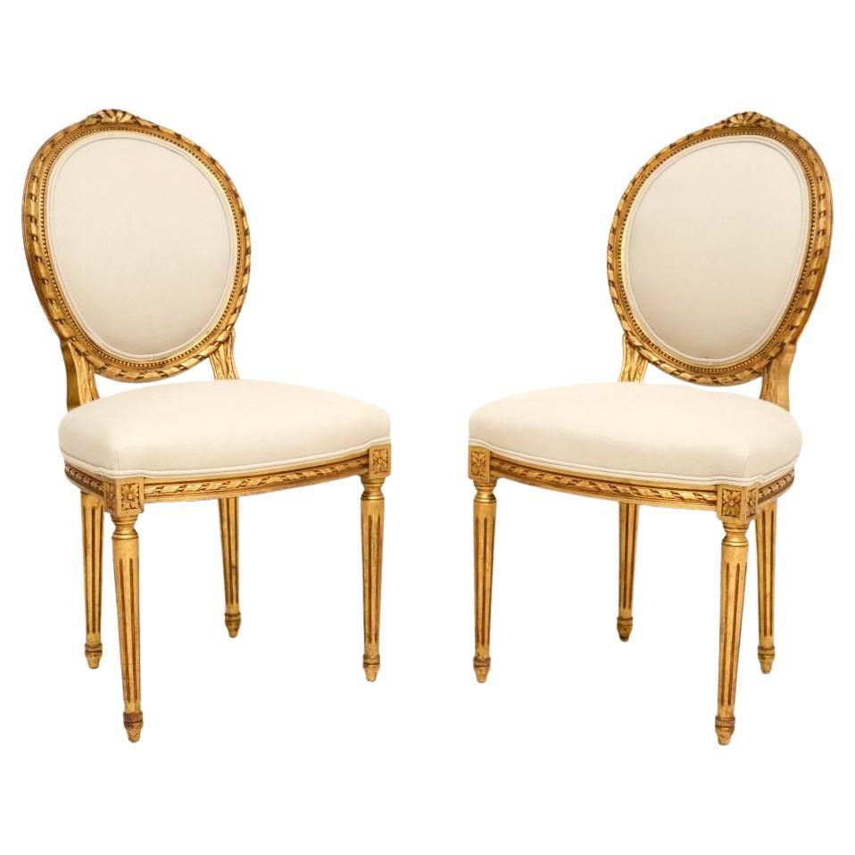 Paire de chaises d'appoint françaises anciennes en bois doré