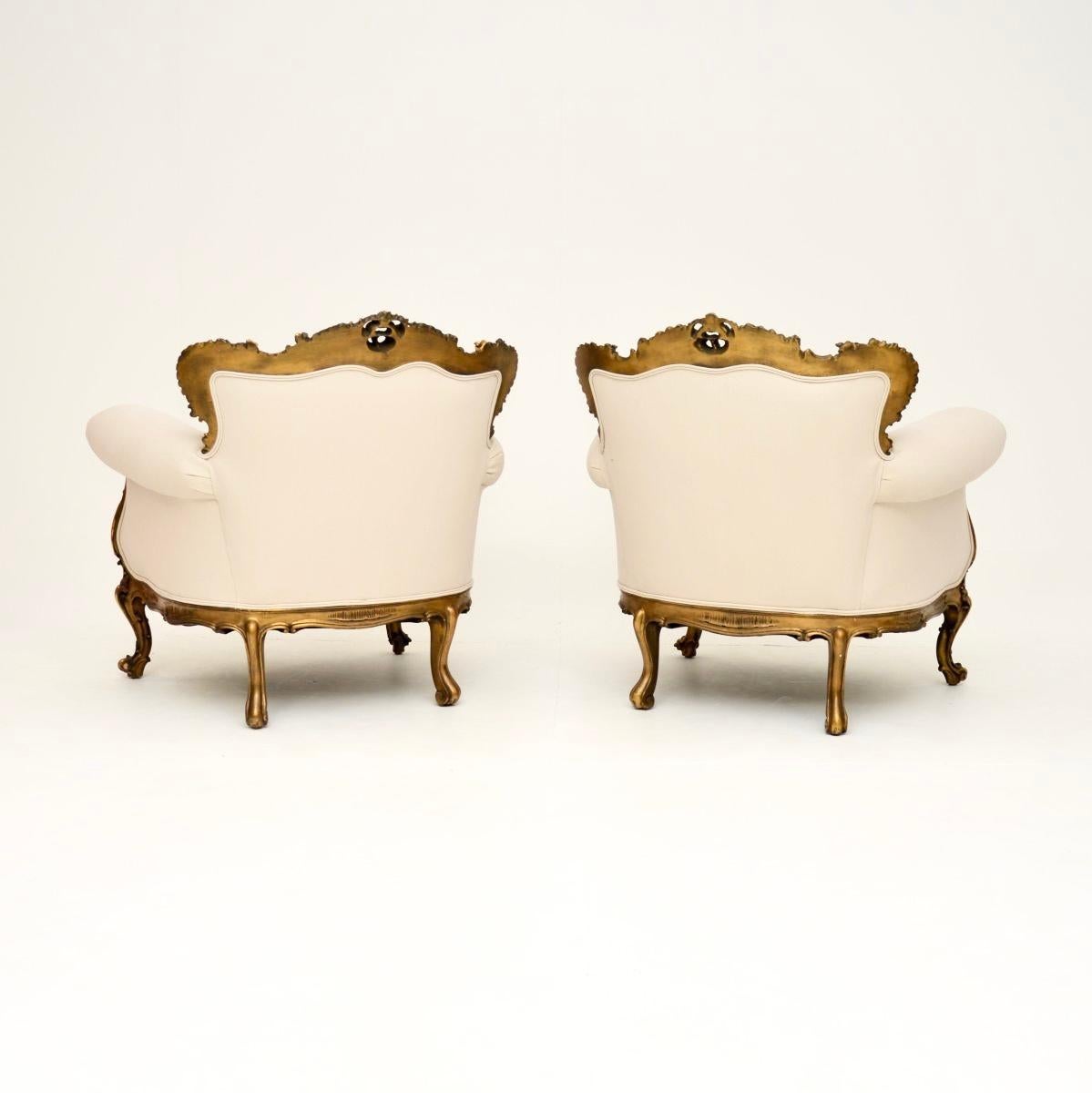 Rococo Pair of Antique French Giltwood Armchairs For Sale