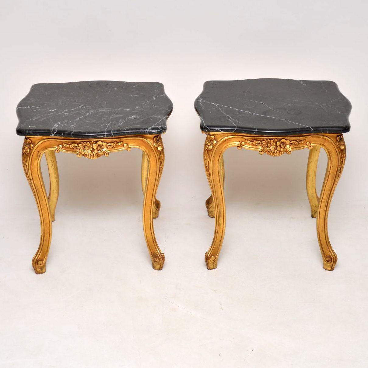 Pair of antique French style giltwood marble-top side tables in good condition and dating from around the 1950s period. The gilt frames are fine quality and well carved. The marble tops are in good condition too, with a few minor scuff marks on the