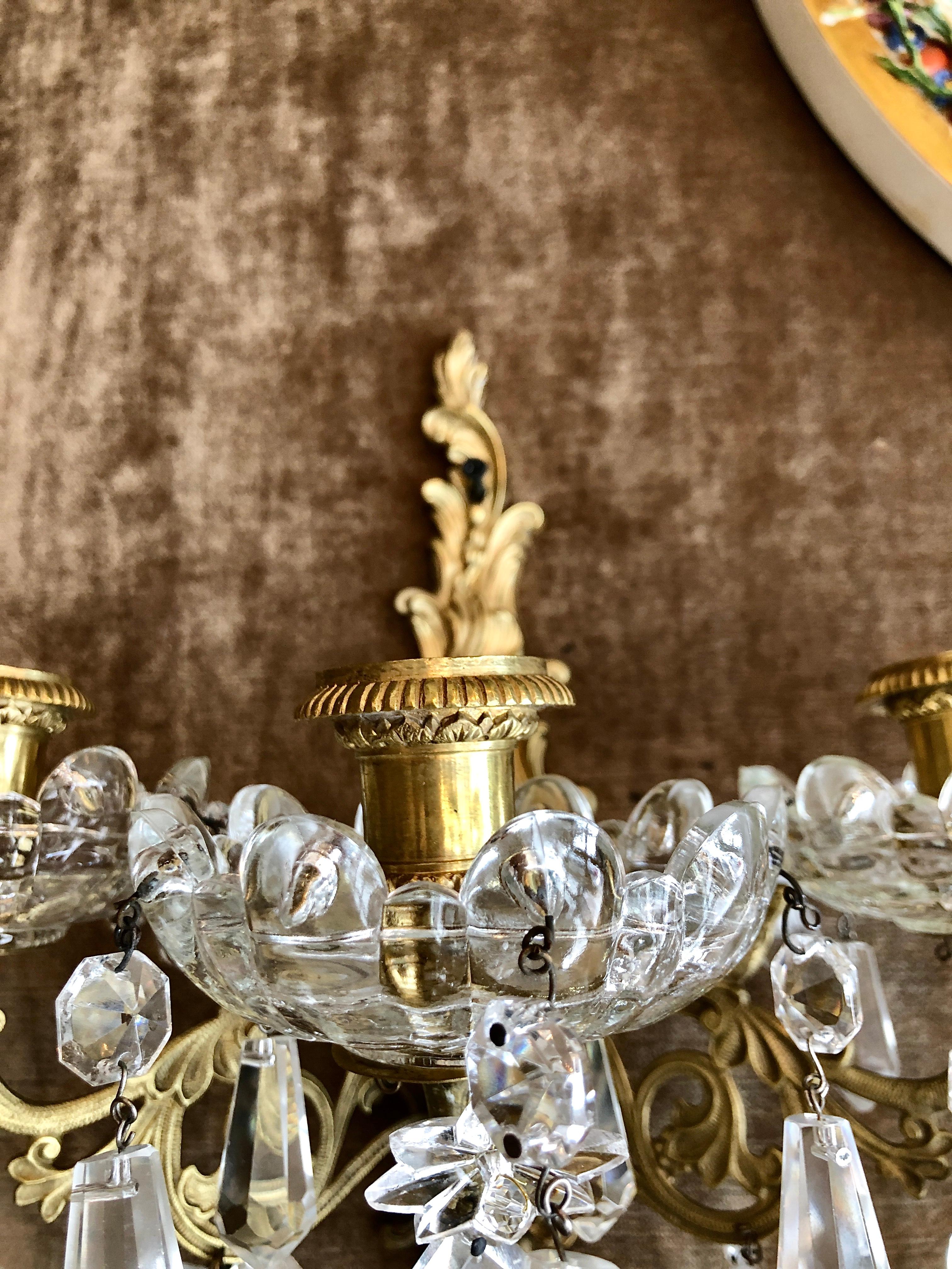 Pair of antique French gold bronze and crystal sconces, Circa 1890-1900.