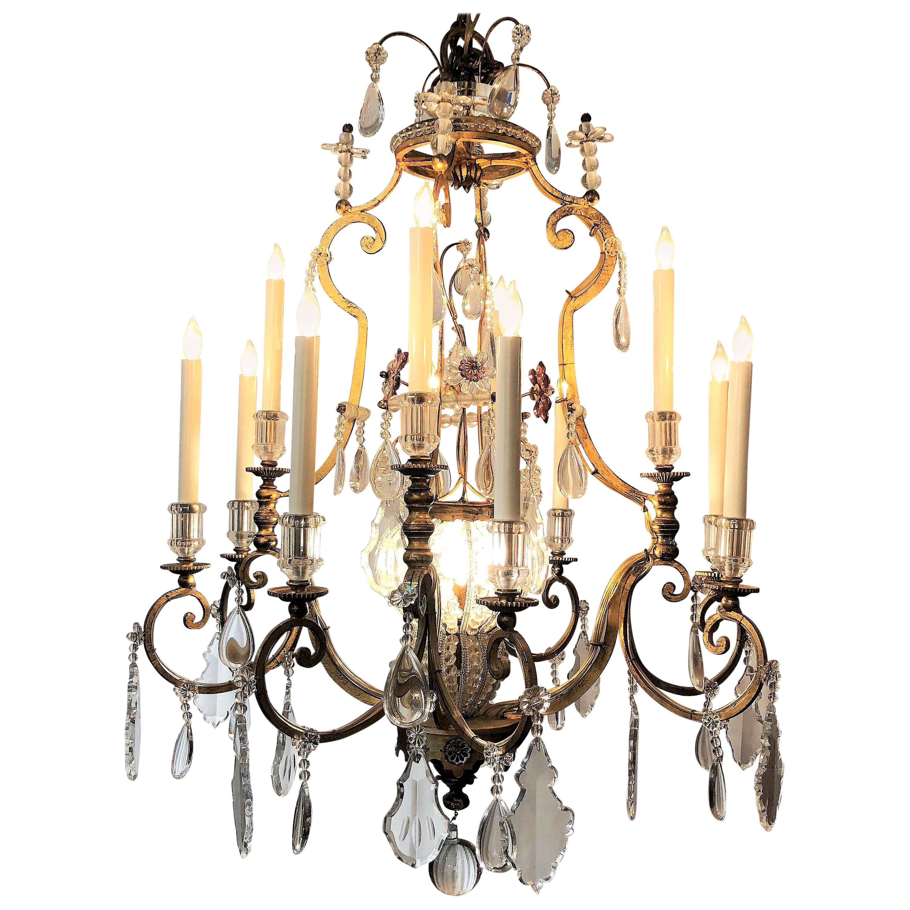 Pair of Antique French Iron and Crystal Chandeliers For Sale