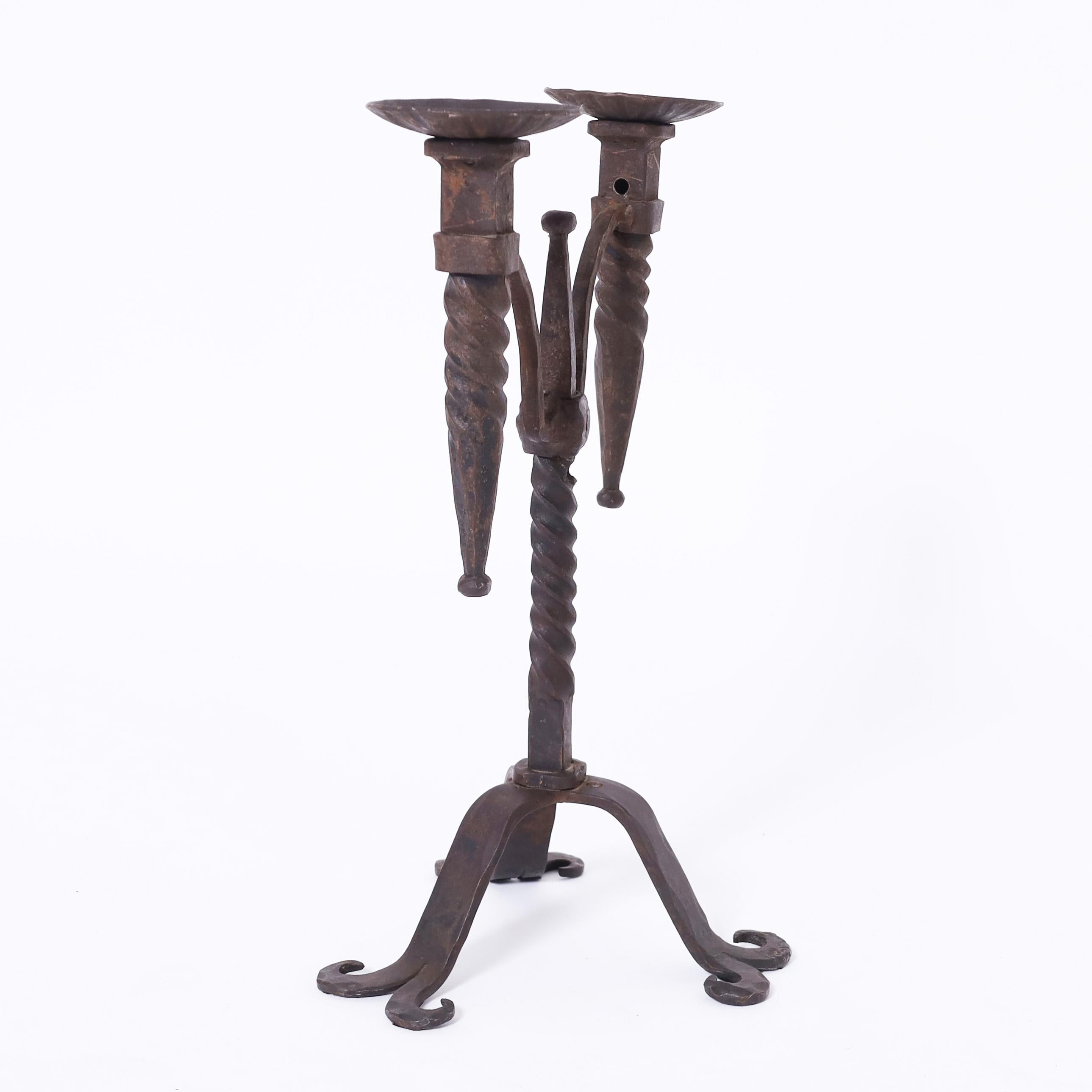 Hand-Crafted Pair of Antique French Iron Candle Sticks For Sale