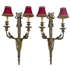 Paire d'appliques anciennes en bronze de style Louis XV attribuées à Delafontaine