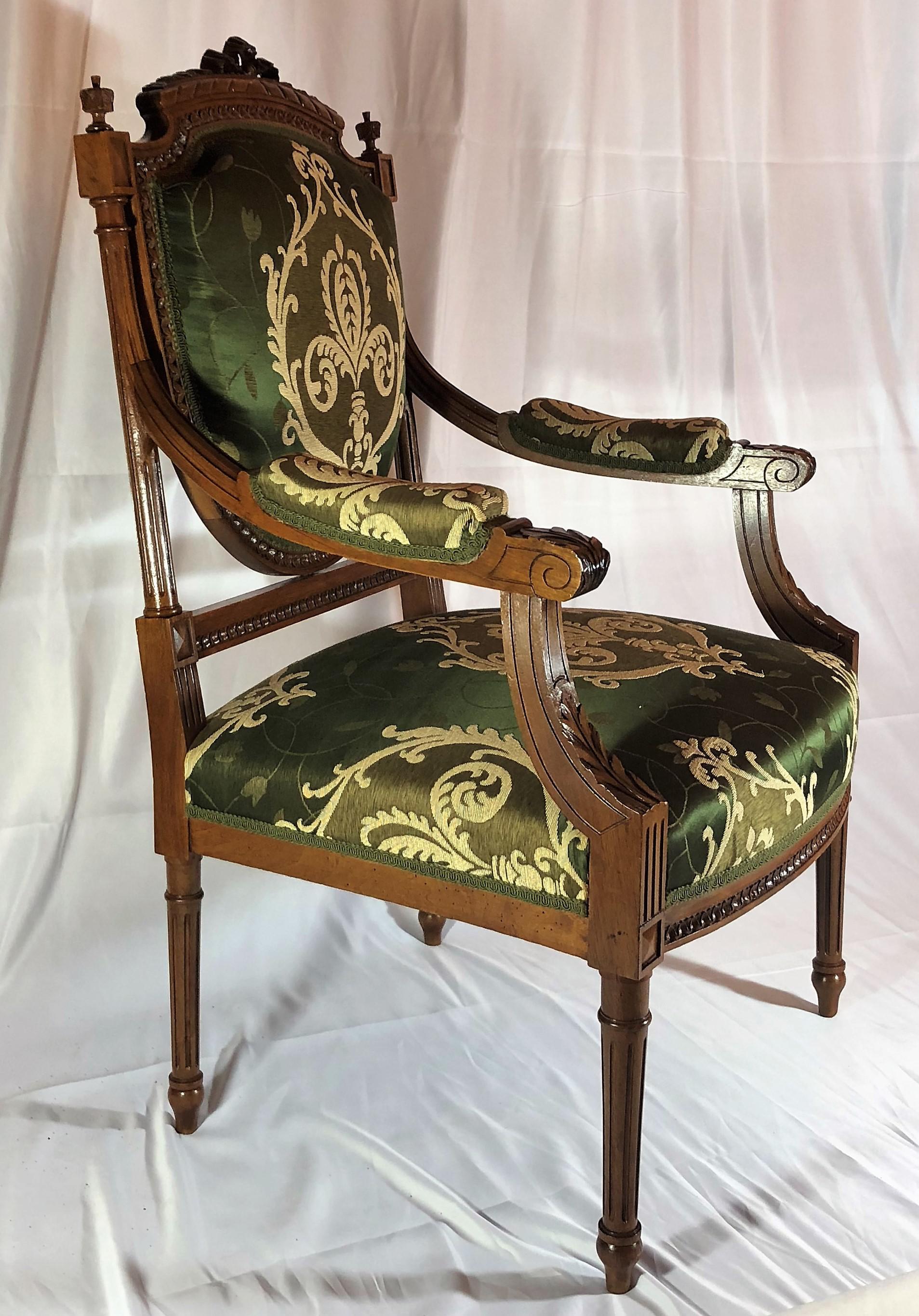 Pair of antique French Louis XVI armchairs.