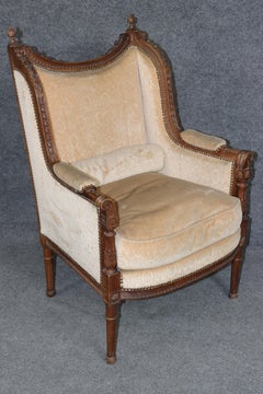 Pair of Antique French Louis XVI Bergère Chairs, Walnut Carved Frames with Down