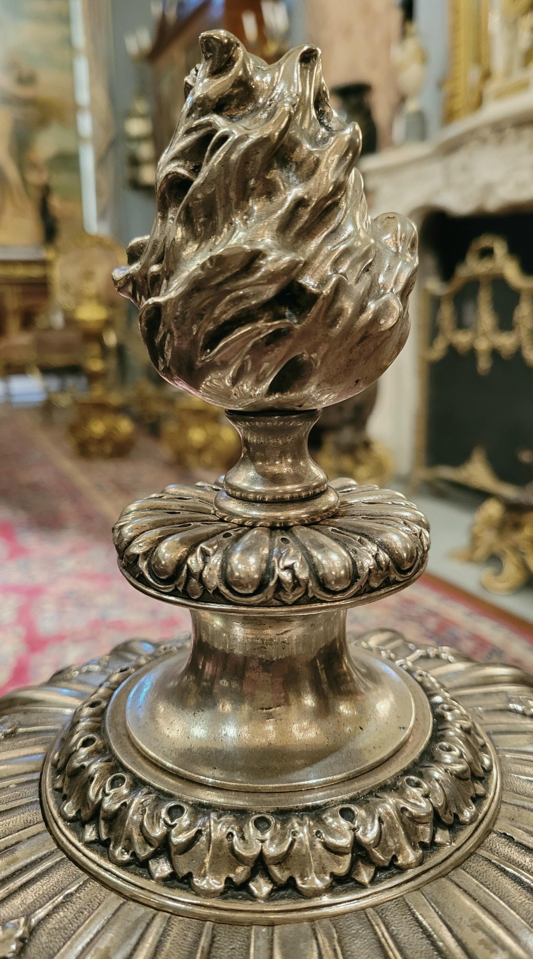 These handsome andirons are showpieces. The bronze work is rich in detail. It is difficult to capture their beauty in photographs.