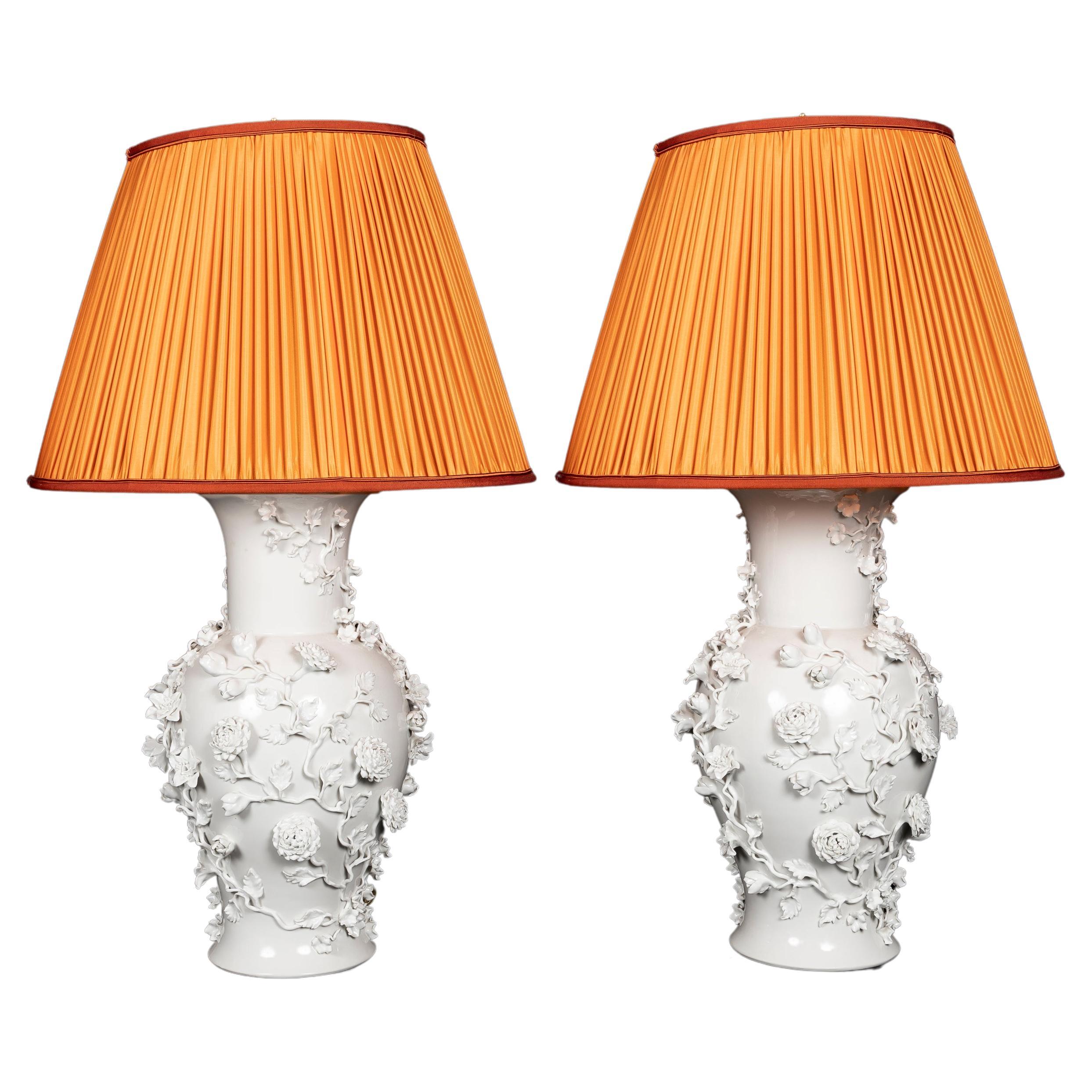 Pair of Antique French Louis XVI Style Blanc de Chine Floral Porcelain lamps For Sale