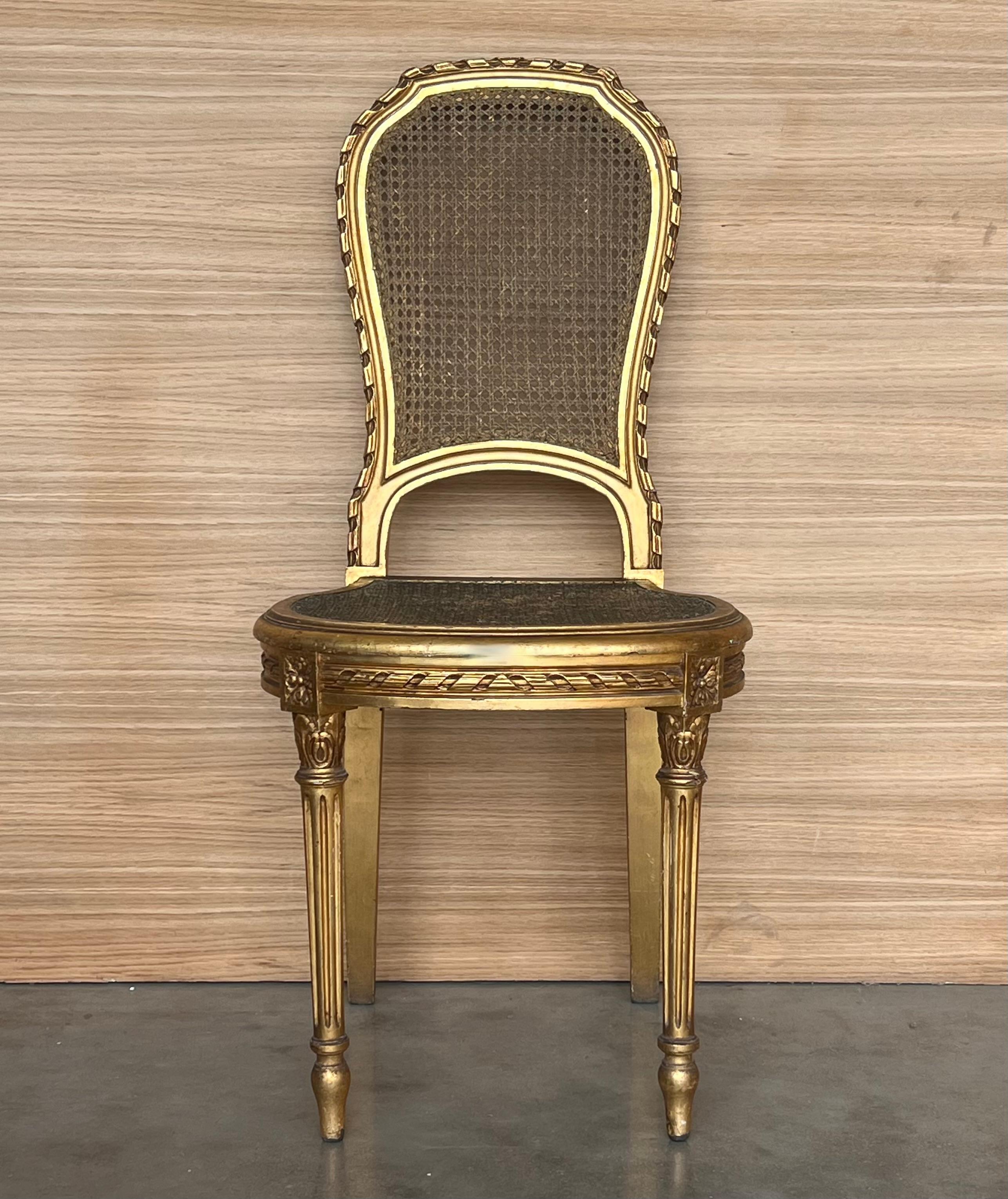 Pair of Antique French Louis XVI Style Gilted Dining Chairs with caned seats In Good Condition For Sale In Miami, FL