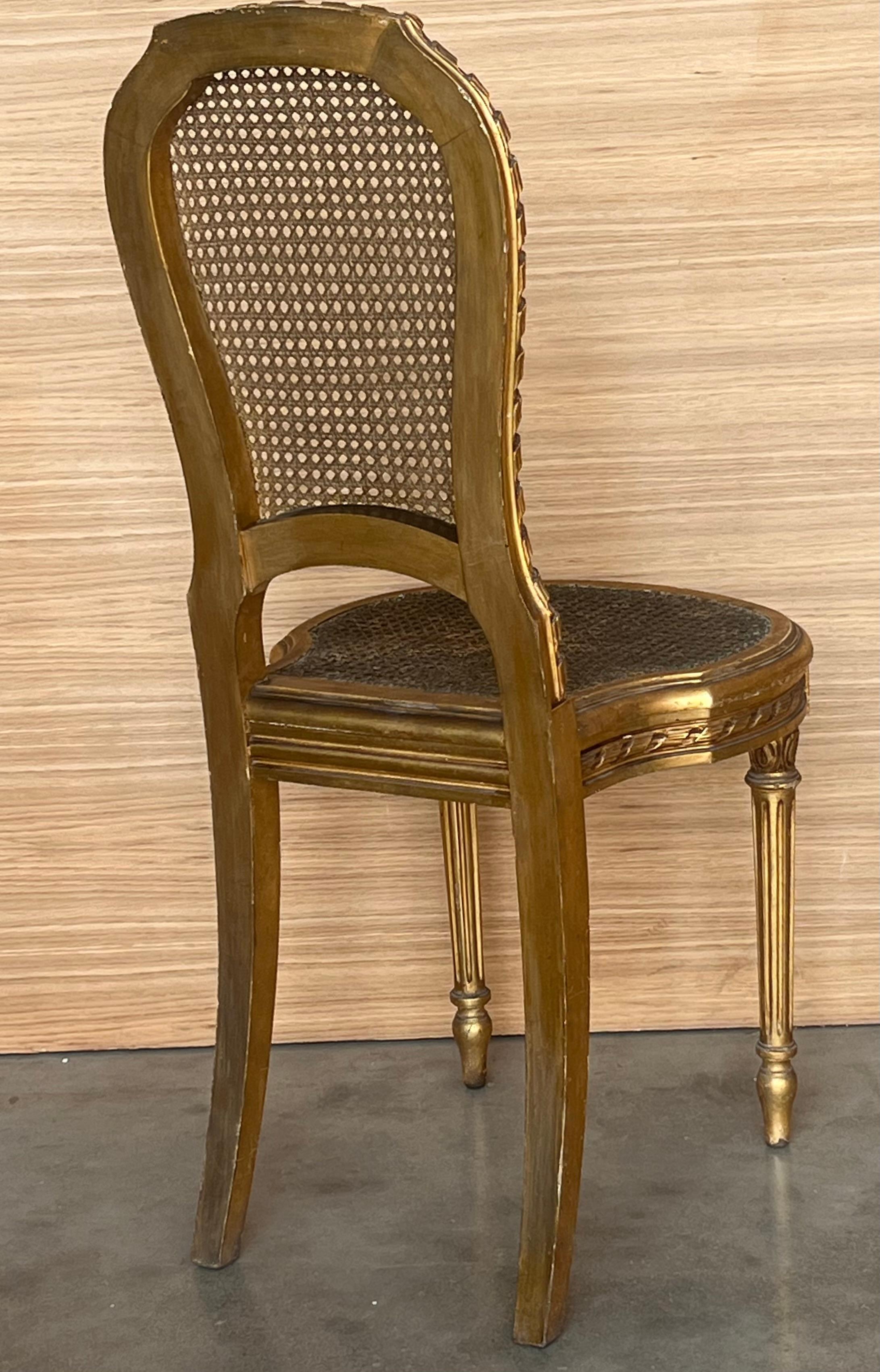 Pair of Antique French Louis XVI Style Gilted Dining Chairs with caned seats For Sale 1