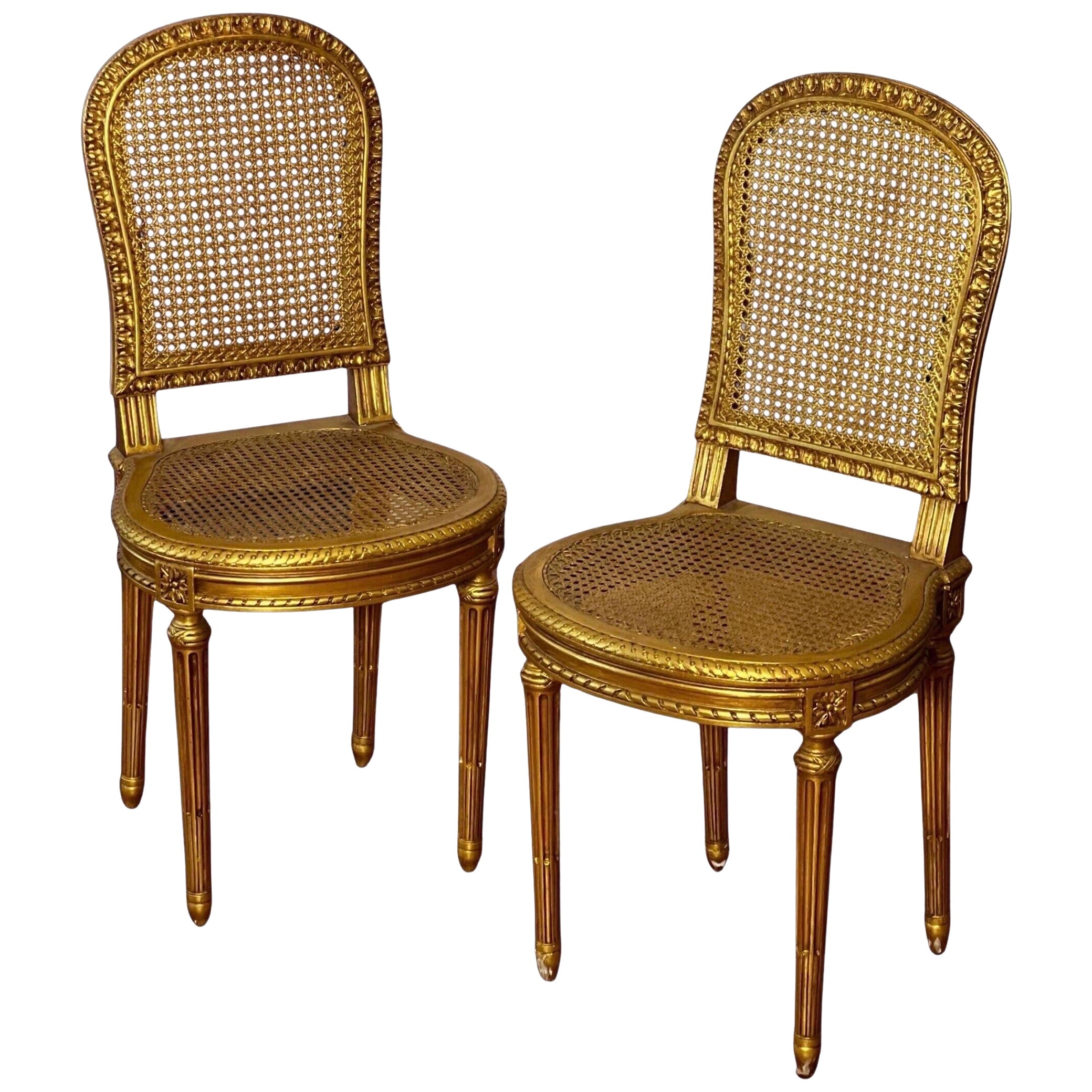 Pair of Antique French Louis XVI Style Giltwood and Cane Side Chairs