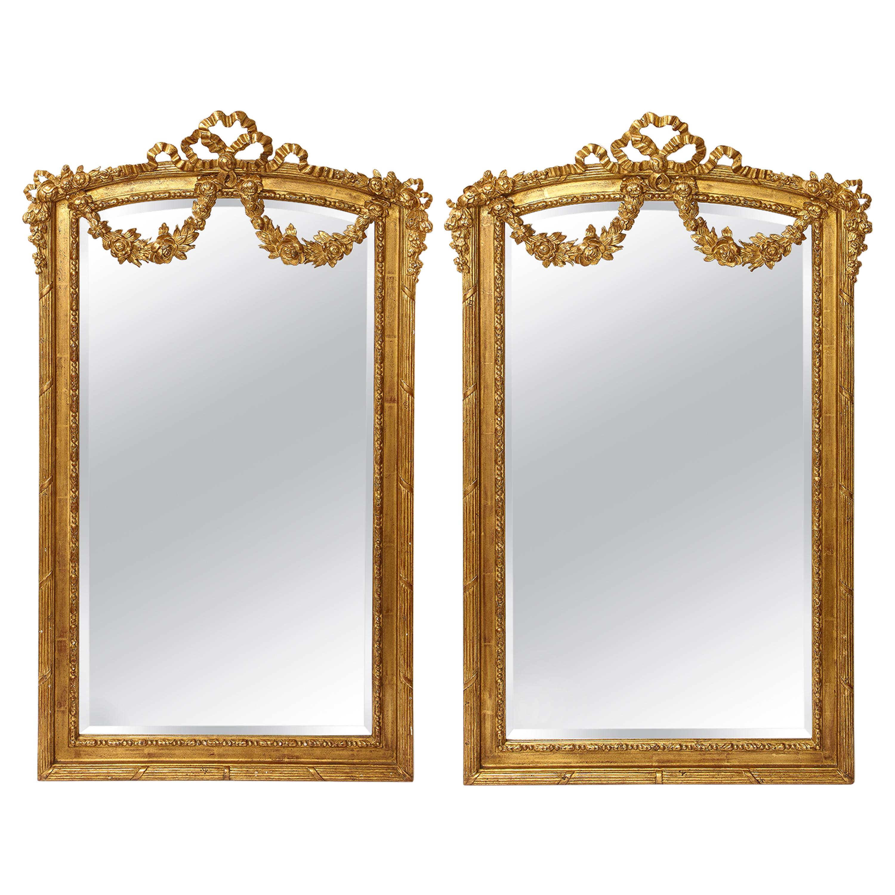 Pair of Antique French Louis XVI Style Hand Carved Giltwood Mirrors For Sale