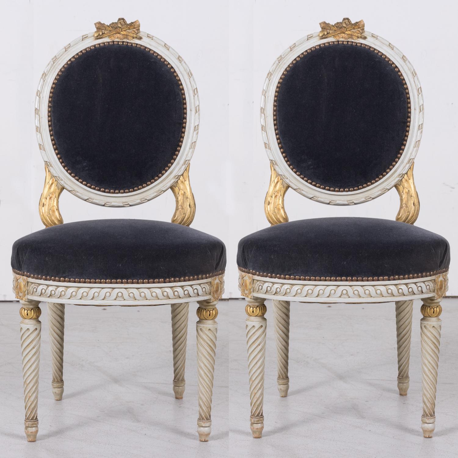 An exceptional pair of 20th century French Louis XVI style painted and parcel gilt side chairs, meticulously  handcrafted in Paris, circa 1920s. A testament to timeless elegance, these chairs  boast exquisite classical styling and unparalleled hand