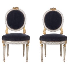 Pair of Antique French Louis XVI Style Parcel Gilt and White Painted Side Chairs