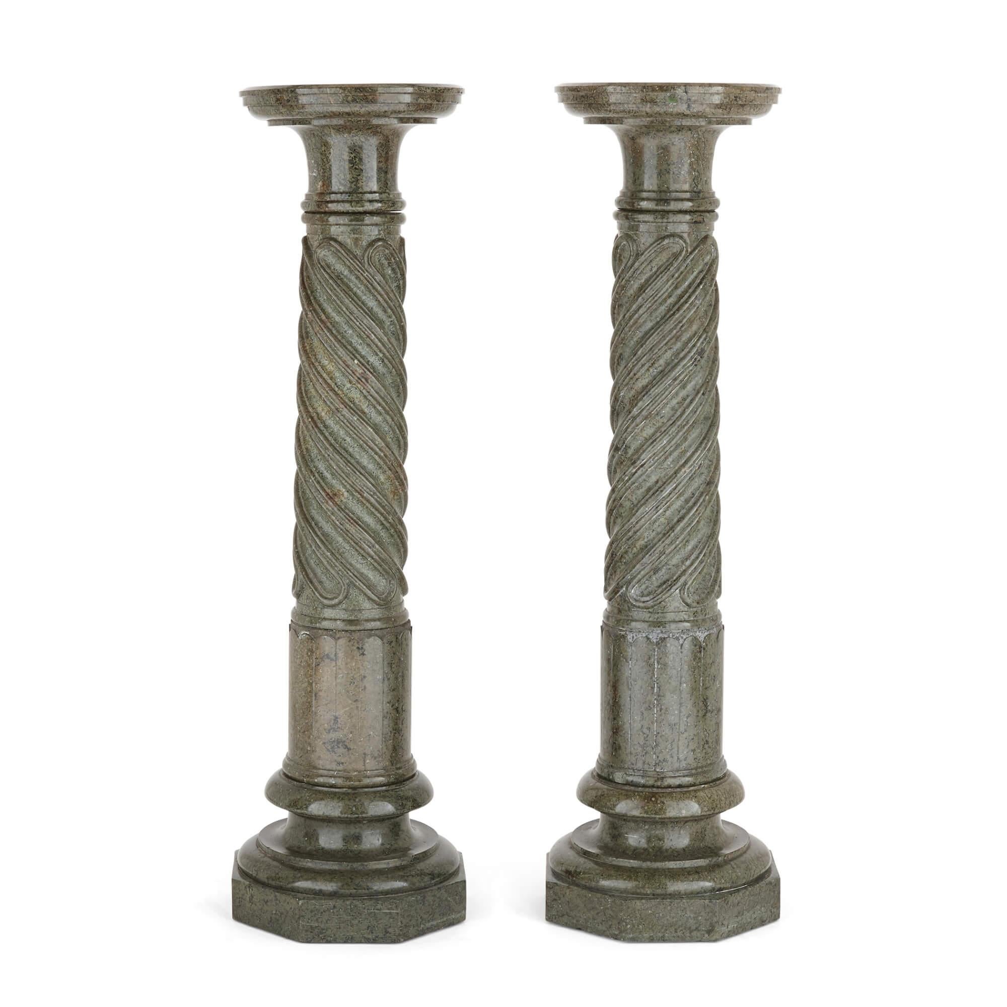 Pair of antique French marble column pedestals
French, 19th Century
Height 107cm, diameter 30.5cm

This pair of grand, green marble pedestals sit on octagonal bases and feature twisting and fluting to the central circular column. They are each