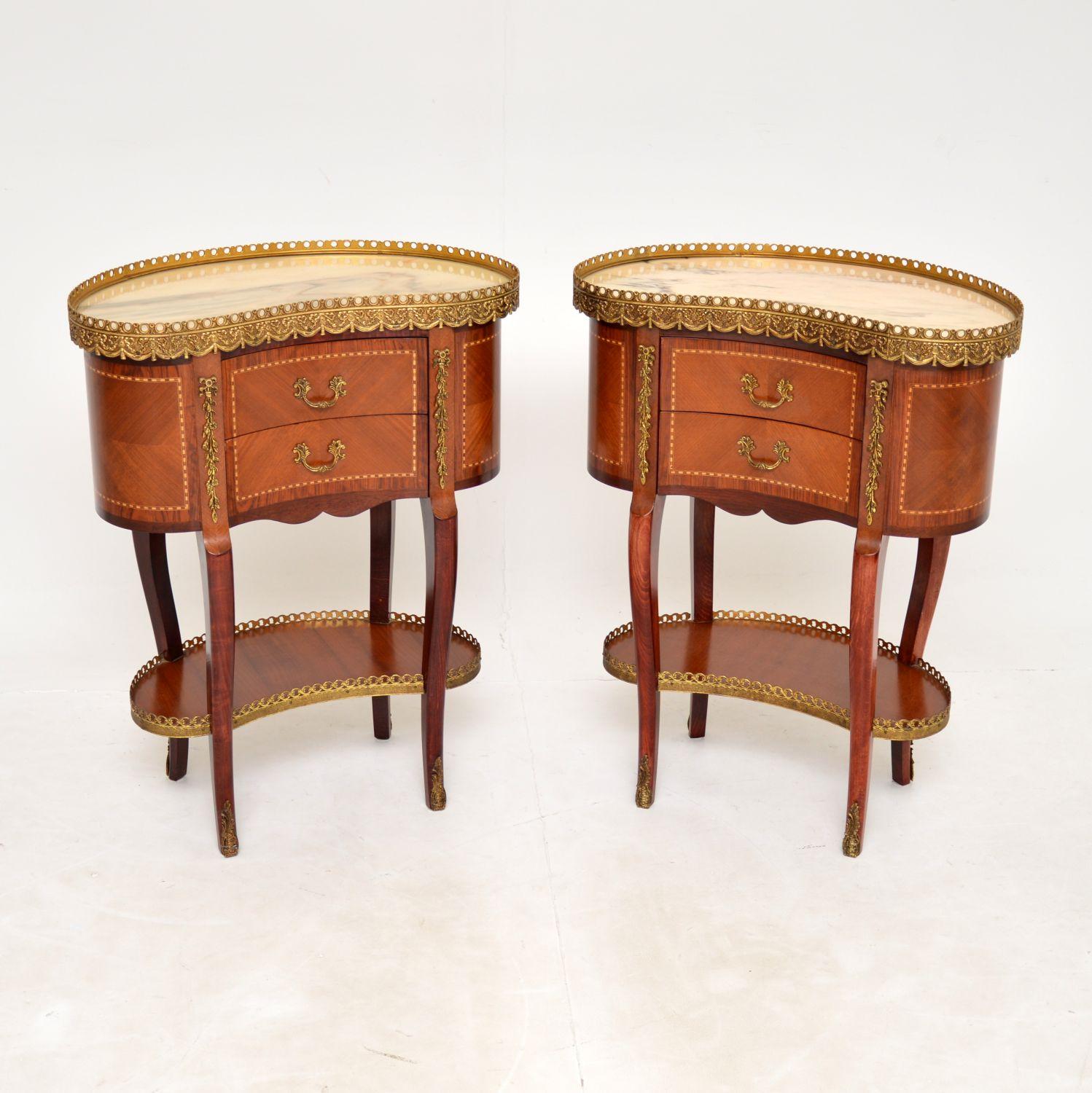 A stunning pair of antique French marble top tables with gilt bronze ormolu mounts. These were made in France, they date from around the 1930-1950’s.

They are of fabulous quality and are a very useful size. They would be perfect for use as