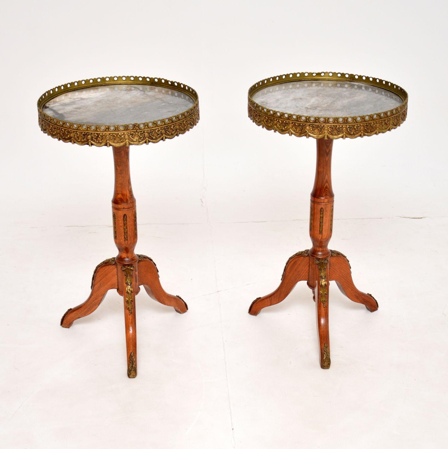 A beautiful pair of antique French style marble top wine tables, dating from around the 1930’s period.

The quality is outstanding and they are a very useful size. The marble tops have gorgeous colours and patterns, they are held in place by high