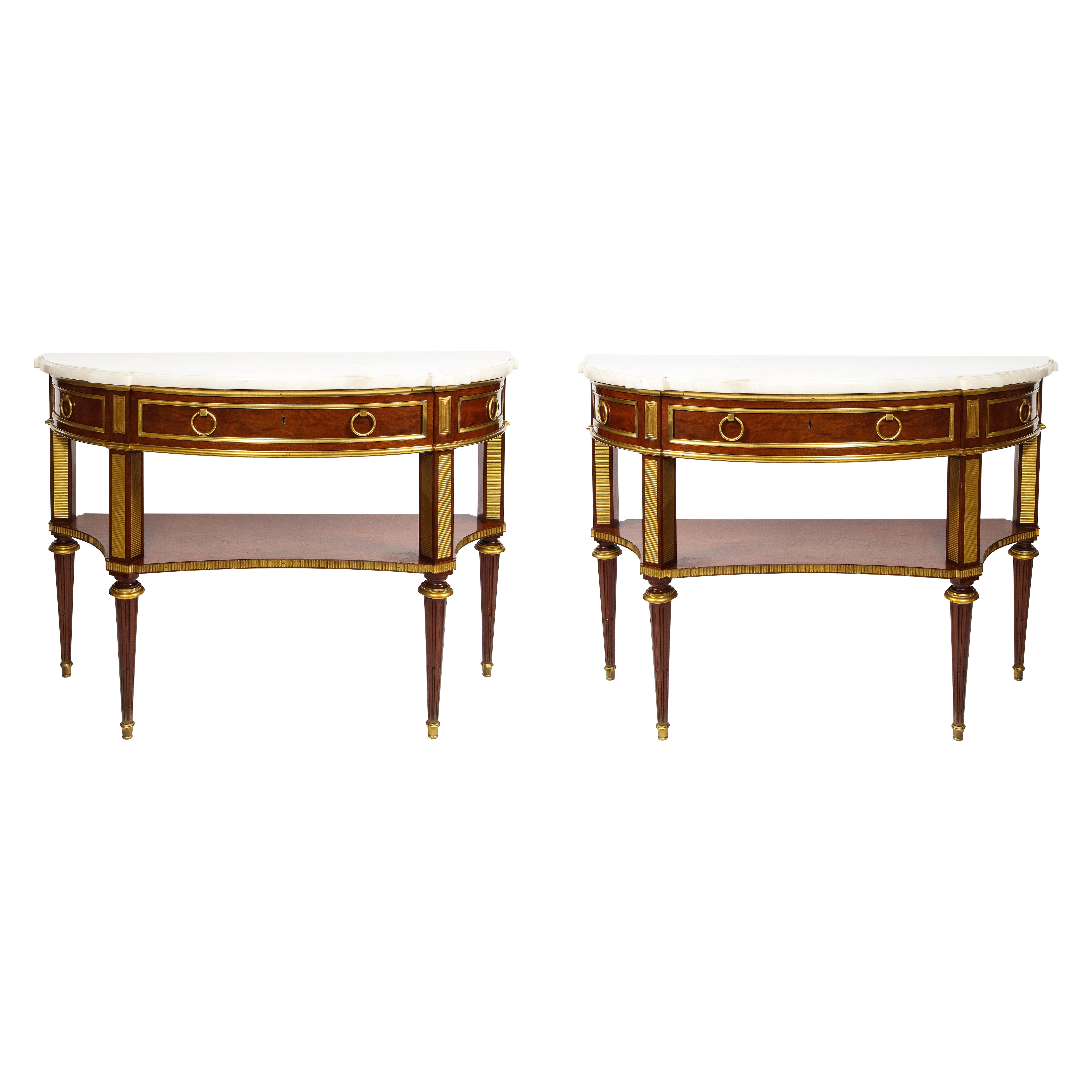 Paire de consoles anciennes de style néoclassique français en bronze doré avec dessus en marbre Mt