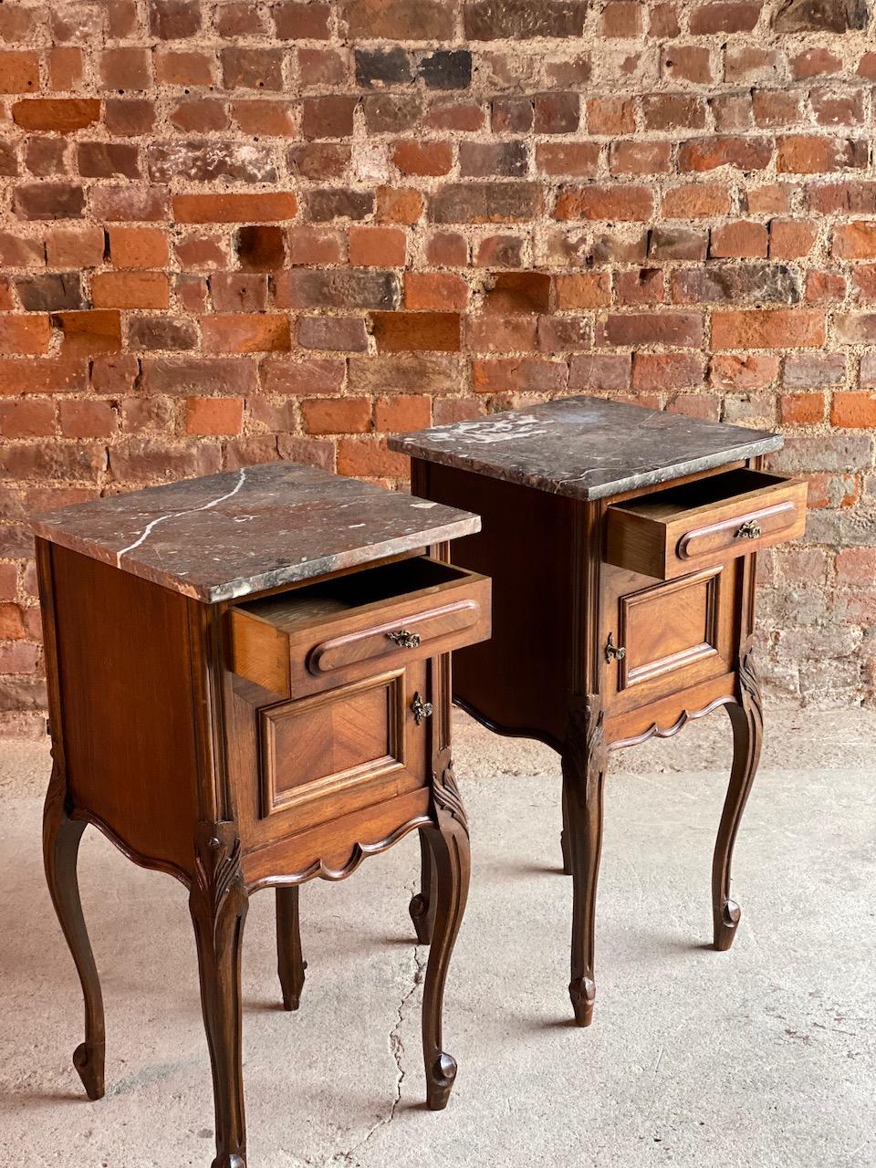 Pair of antique French nightstands bedside tables marble, Victorian, 1890

Fabulous pair of antique 19th century French marble topped bedside cabinets or nightstands dating from the late 19th century to circa 1890, the tops with grey veined marble