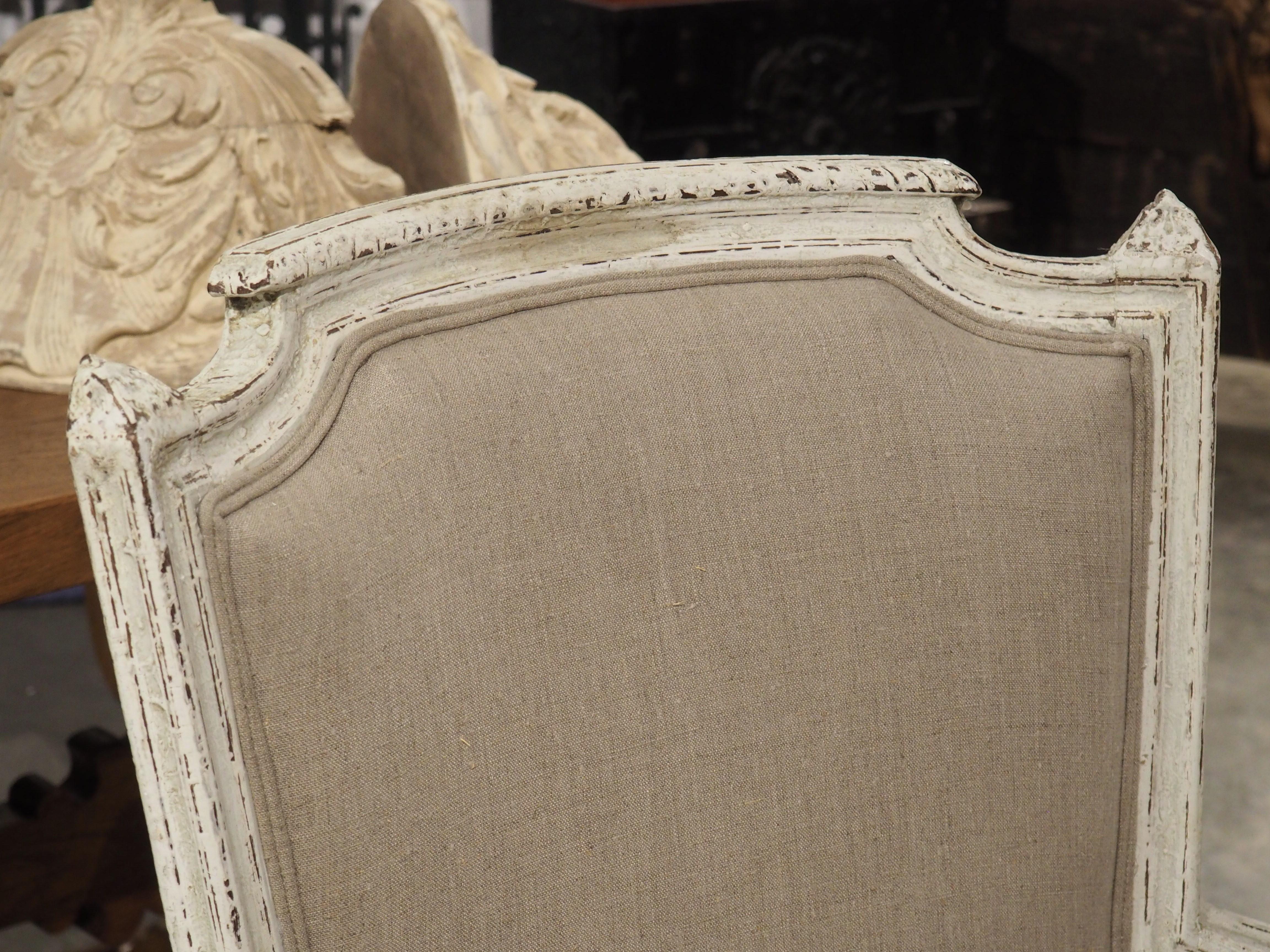 The period of French history known as Directoire was a difficult time, as it arrived at the end of the Revolutionary War. Furnishings in this style, such as our pair of painted armchairs (circa 1900), were less ornate than offerings from past