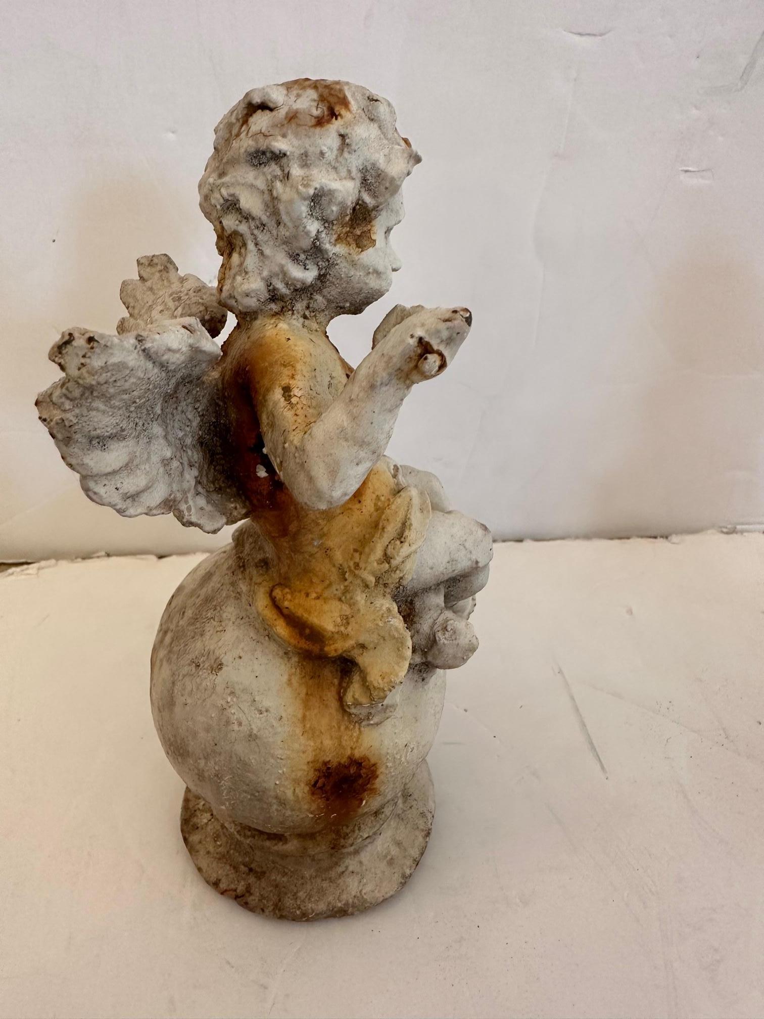 Pair of Antique French Painted Iron Putti Cherub Sculptures Garden Ornaments In Distressed Condition For Sale In Hopewell, NJ