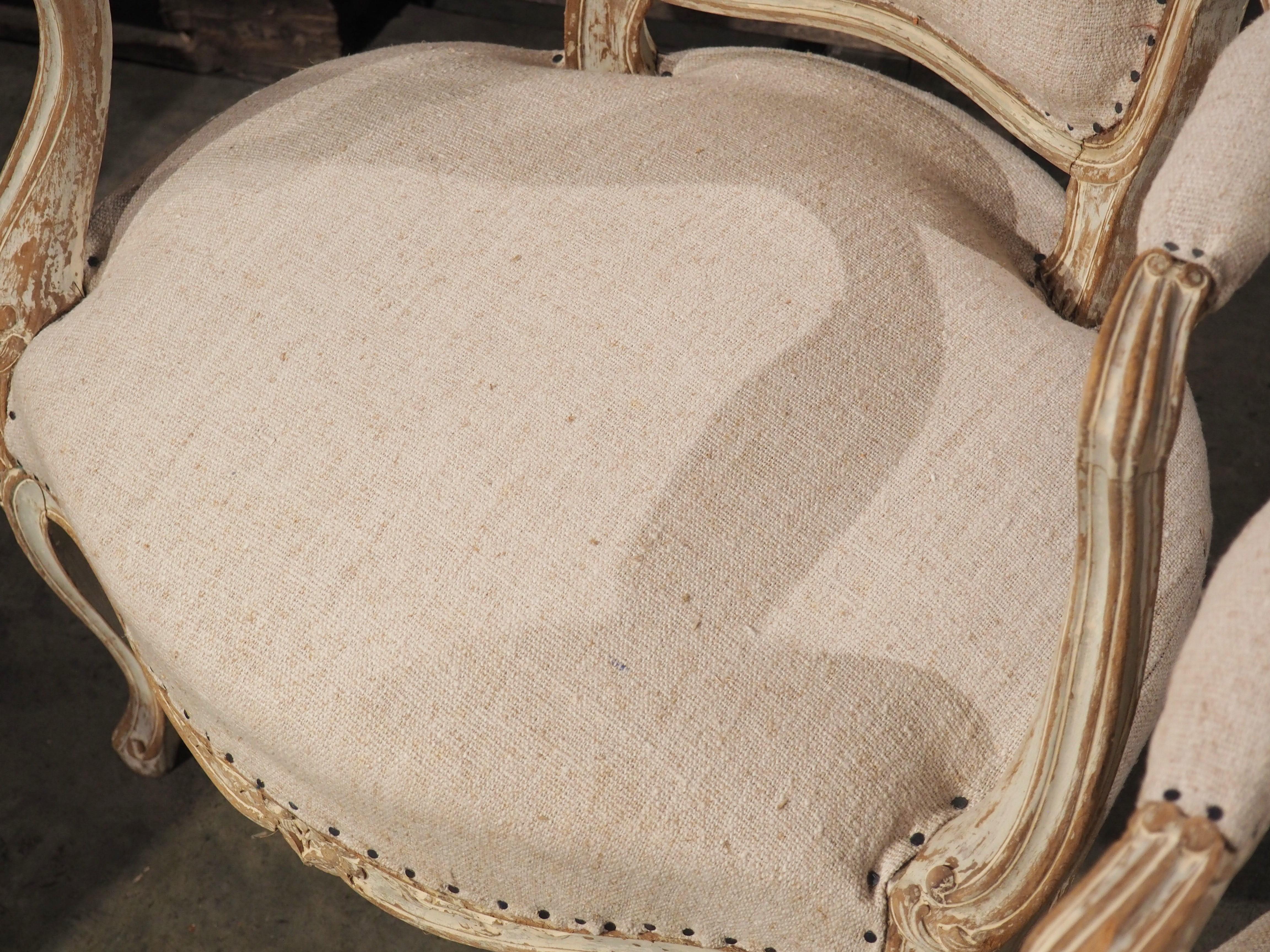 One of the most popular types of chairs from the reign of Louis XV was known as a cabriolet armchair, which was easy to move around to accommodate guests. The pair of parcel paint cabriolet armchairs seen here were hand-carved in France in the late