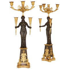 Pair of Antique French Patinated and Gilt Bronze Candelabra