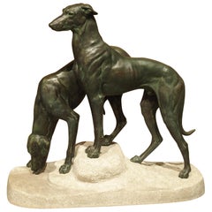 Pair of Antique French Patinated Bronze Greyhounds on a Granite Base, circa 1920