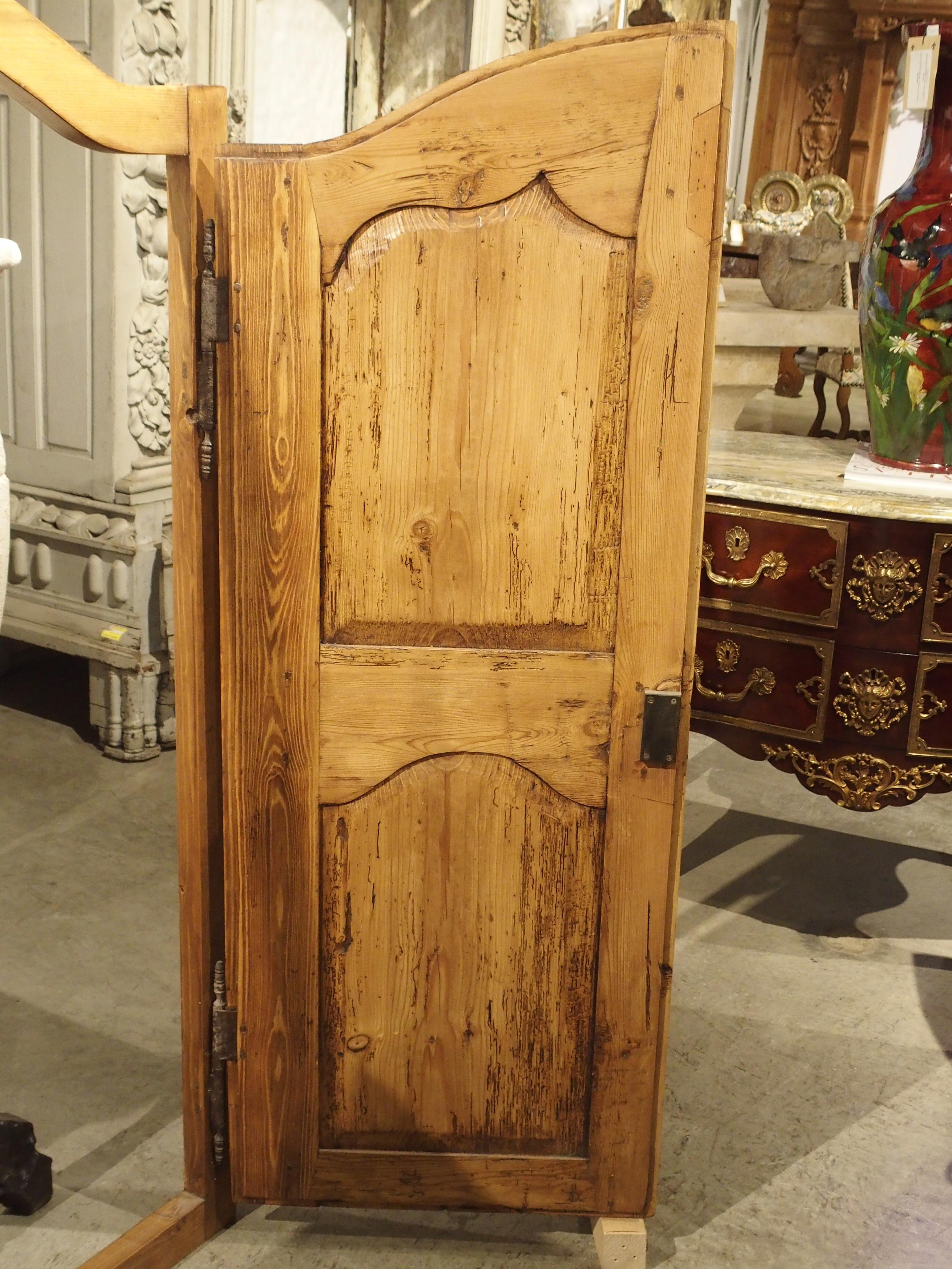 These versatile antique French framed doors probably once graced the front of a deux corps. Today they are used as cabinet door frontages, decorative door panels opening to a painting or other decorative object, or astride a mantle as doors for
